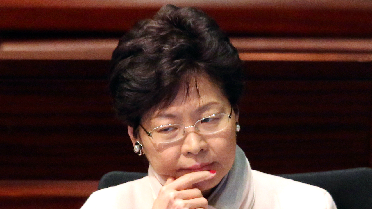 Chief Secretary Carrie Lam listens to the debate .on the chief executive’s policy address. Photo: Edward Wong