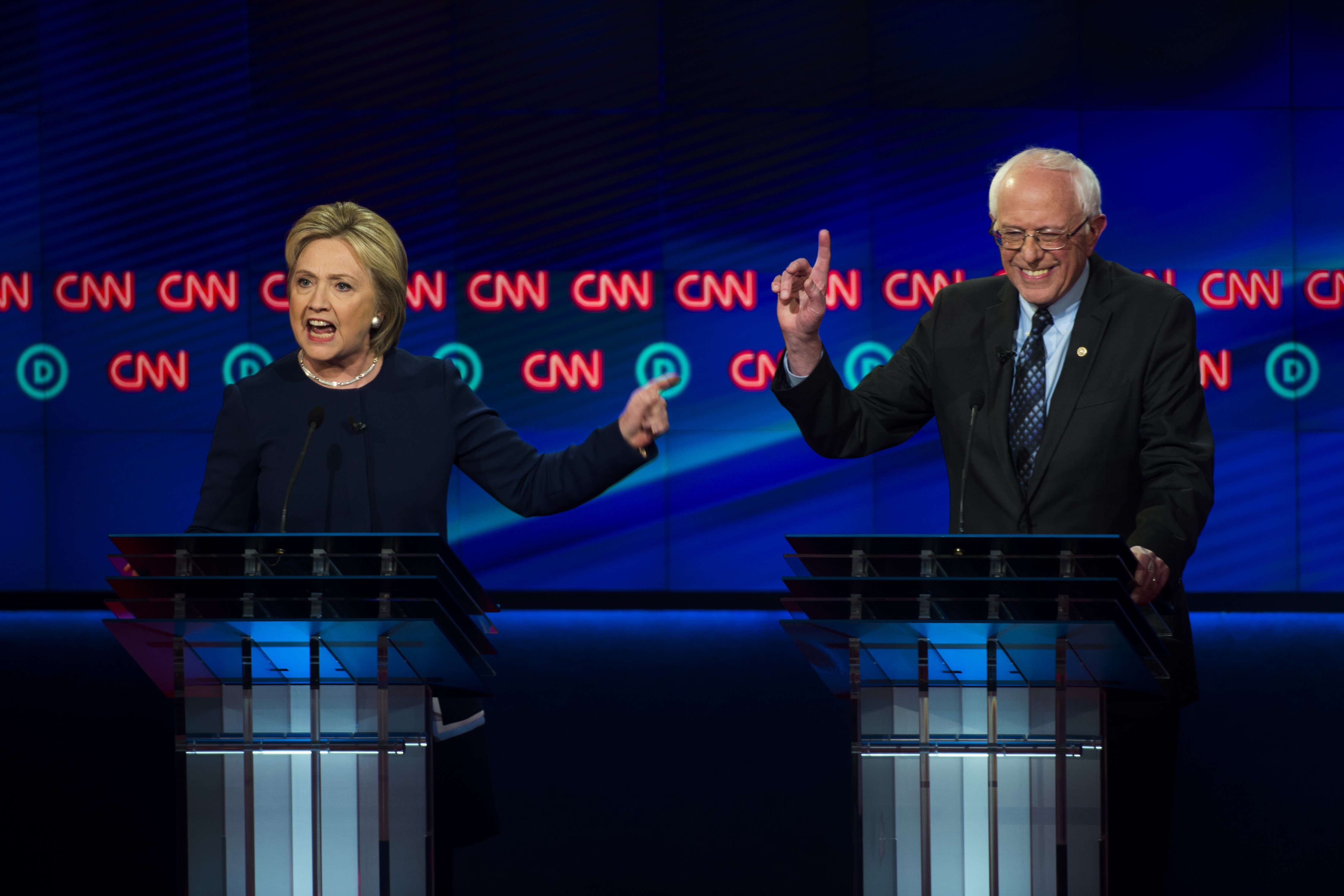 Democratic candidates Hillary Clinton, left, and Bernie Sanders face off in Flint Michigan in the final run-off to the presidential primaries. Photo: AP