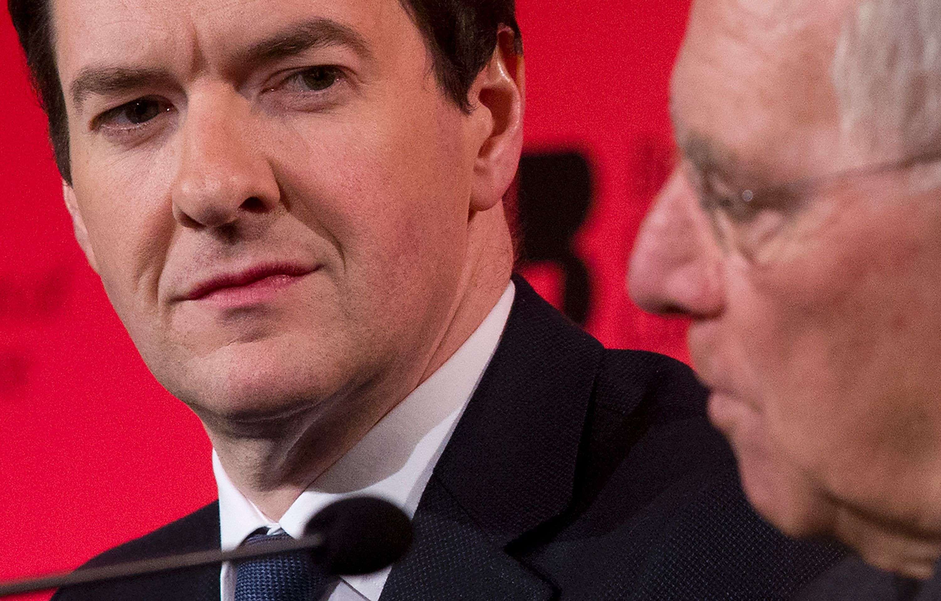 British Chancellor of the Exchequer George Osborne (left) and German Finance Minister Wolfgang Schaeuble speak at the British Chambers of Commerce conference in London. The EU would be ”less stable” if Britain voted to leave, Schaeuble told British business leaders. Photo: AFP