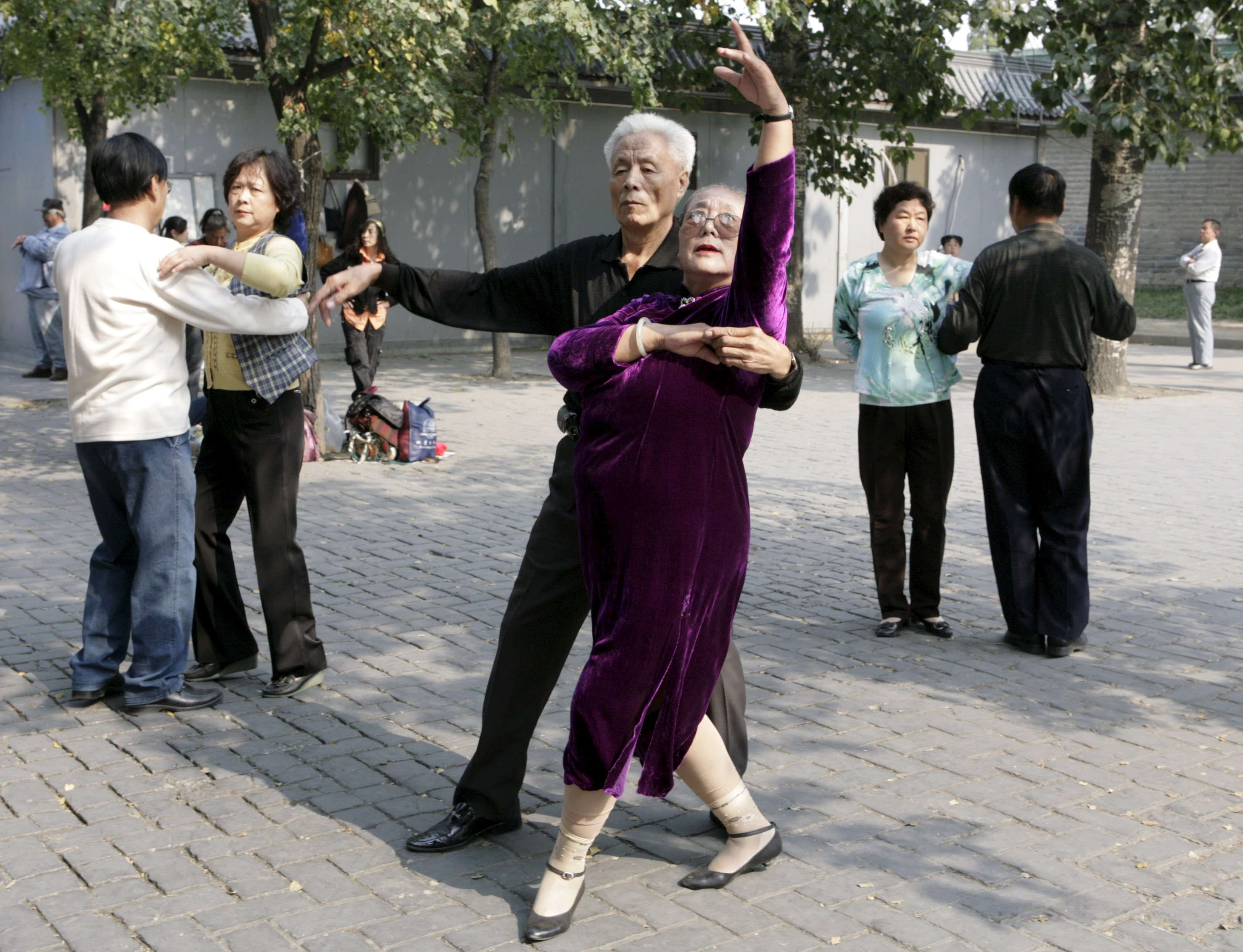 Couples dance at the Temple of Heaven park in Beijing. Premier Li Keqiang has promised China will meet its pension obligations. Photo: Reuters