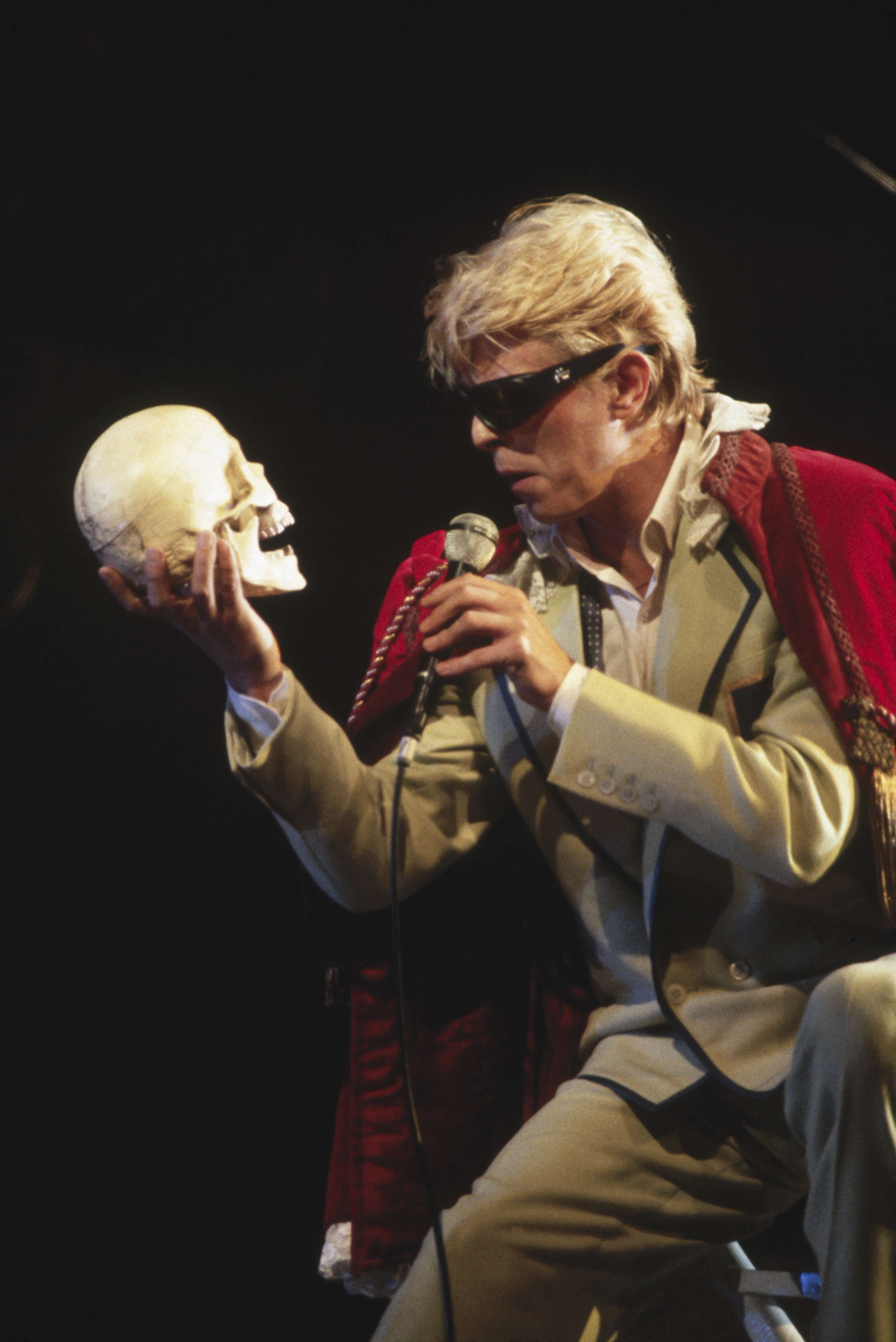 Bowie making a reference to Shakespeare’s Hamlet during the “Serious Moonlight” tour in the 1980s. Bowie was a constant reader and brought his reading into all aspects of his work. Photo: Corbis