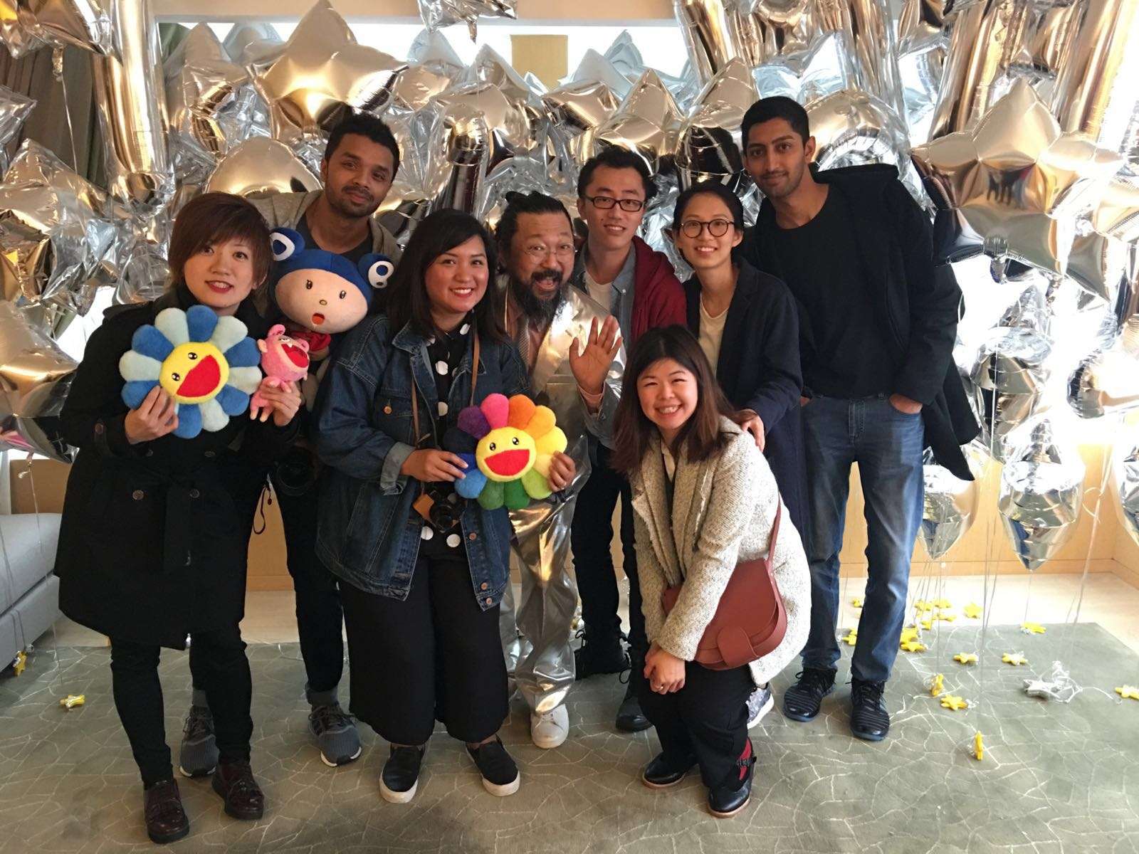 Takashi Murakami meets some of his Hong Kong followers at an ‘InstaMeet’ at a hotel suite in the city decorated with silver balloons this morning. Photo: Handout