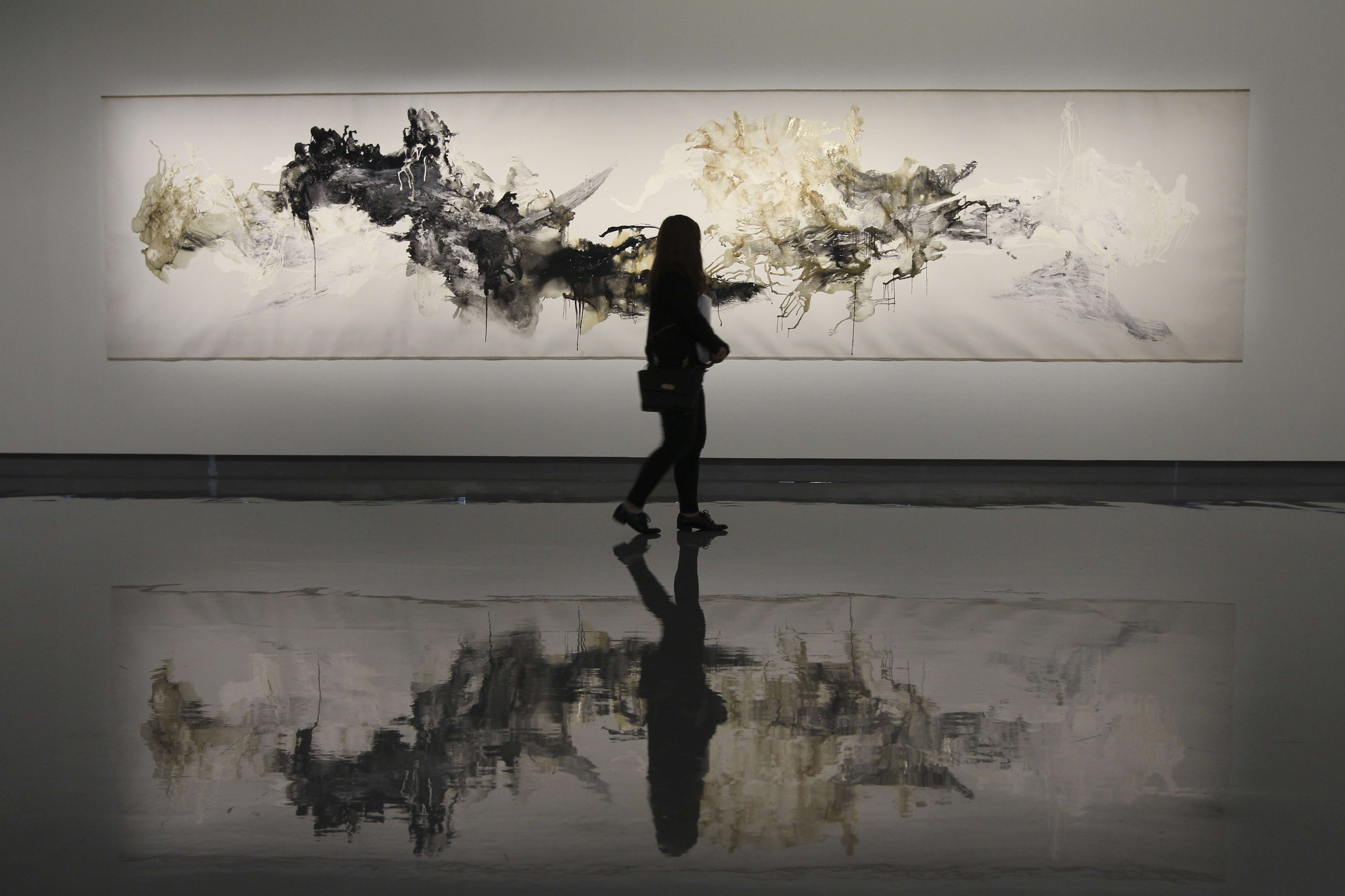 <p>Artist who choreographed Beijing Olympics opening ceremony likens process of applying oil paints to canvases such as those in Hong Kong exhibition to  putting dance steps to musical orchestration</p>