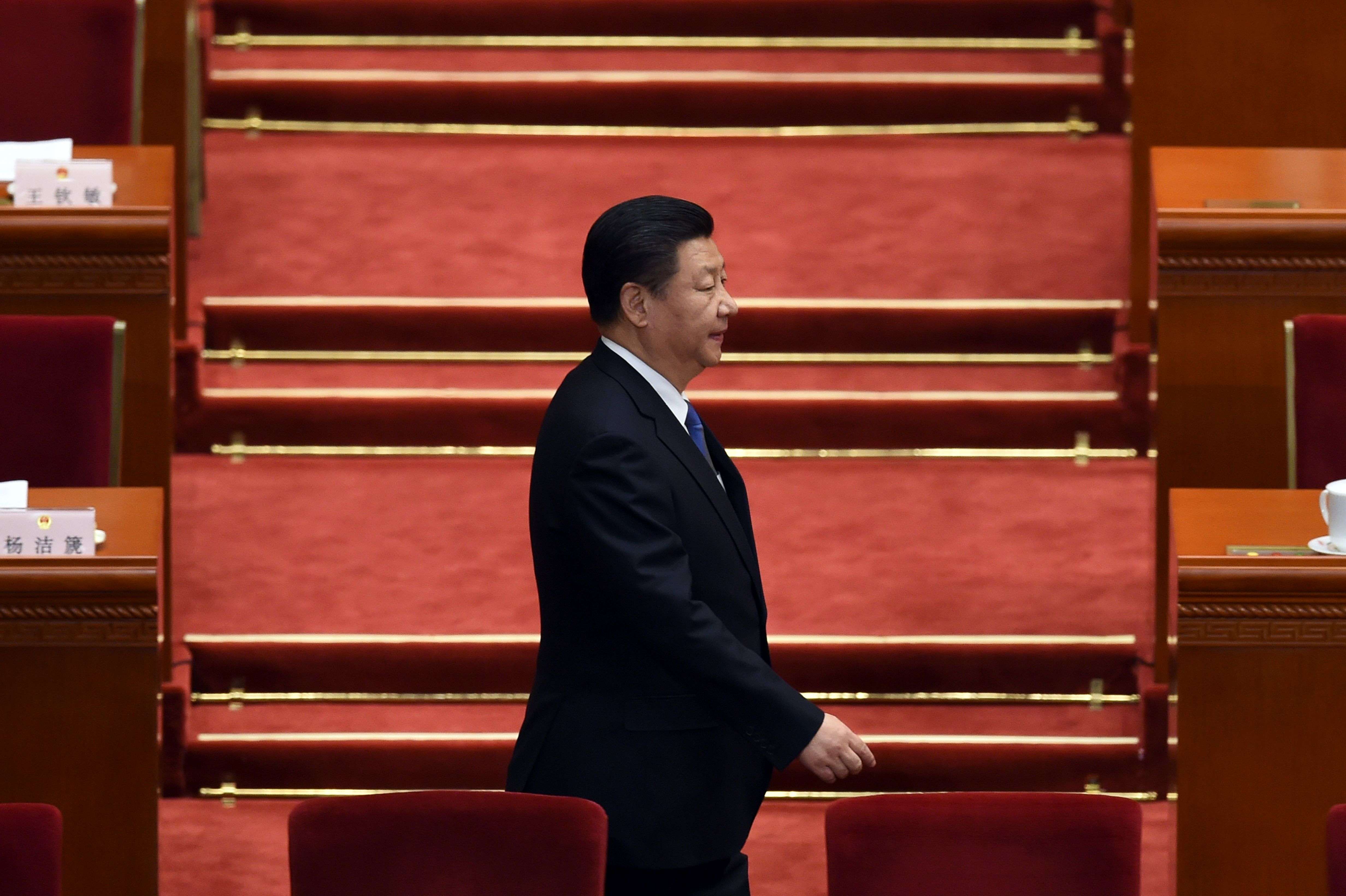 President Xi Jinping arrives for a session of the National People's Congress in the Great Hall of the People in Beijing, where a new five-year plan was approved. Photo: AFP