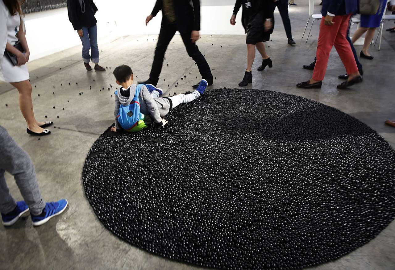 Some children did not give due reverence to the artworks on display at Art Basel. Photo: AP