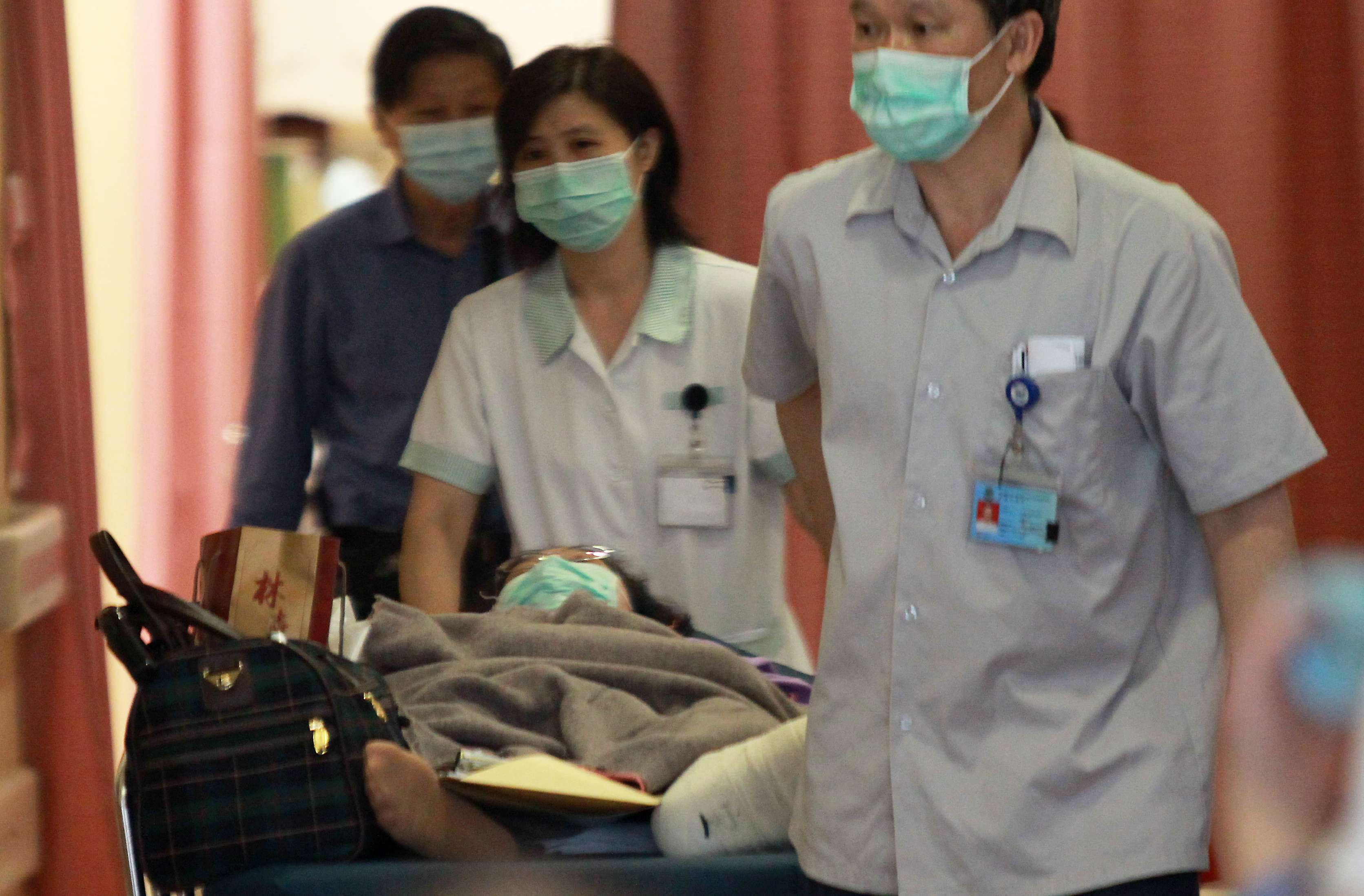 In a 2014 survey of 1,600 nurses in Hong Kong, the average job satisfaction rating was 3.9 out of 10. The survey also revealed that nurses thought they were short on staff 81 per cent of the time. This past winter, only one of 16 public hospitals were not at more than 100 per cent occupancy. Photo: Edward Wong