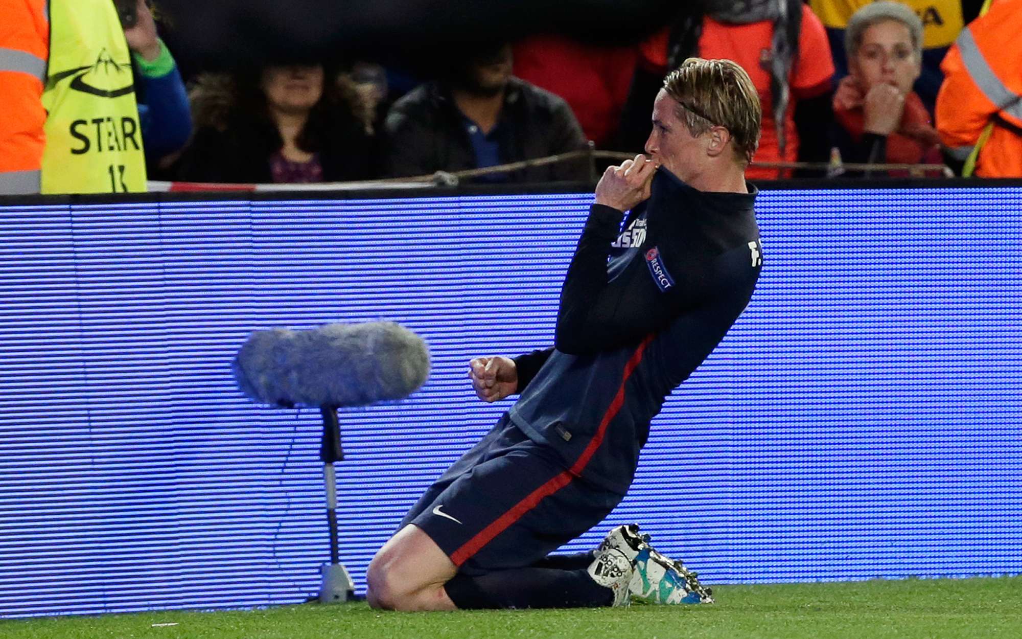 Fernando Torres celebrates scoring the opening goal for Atletico Madrid against Barcelona. His delight was short-lived. Photo: AP