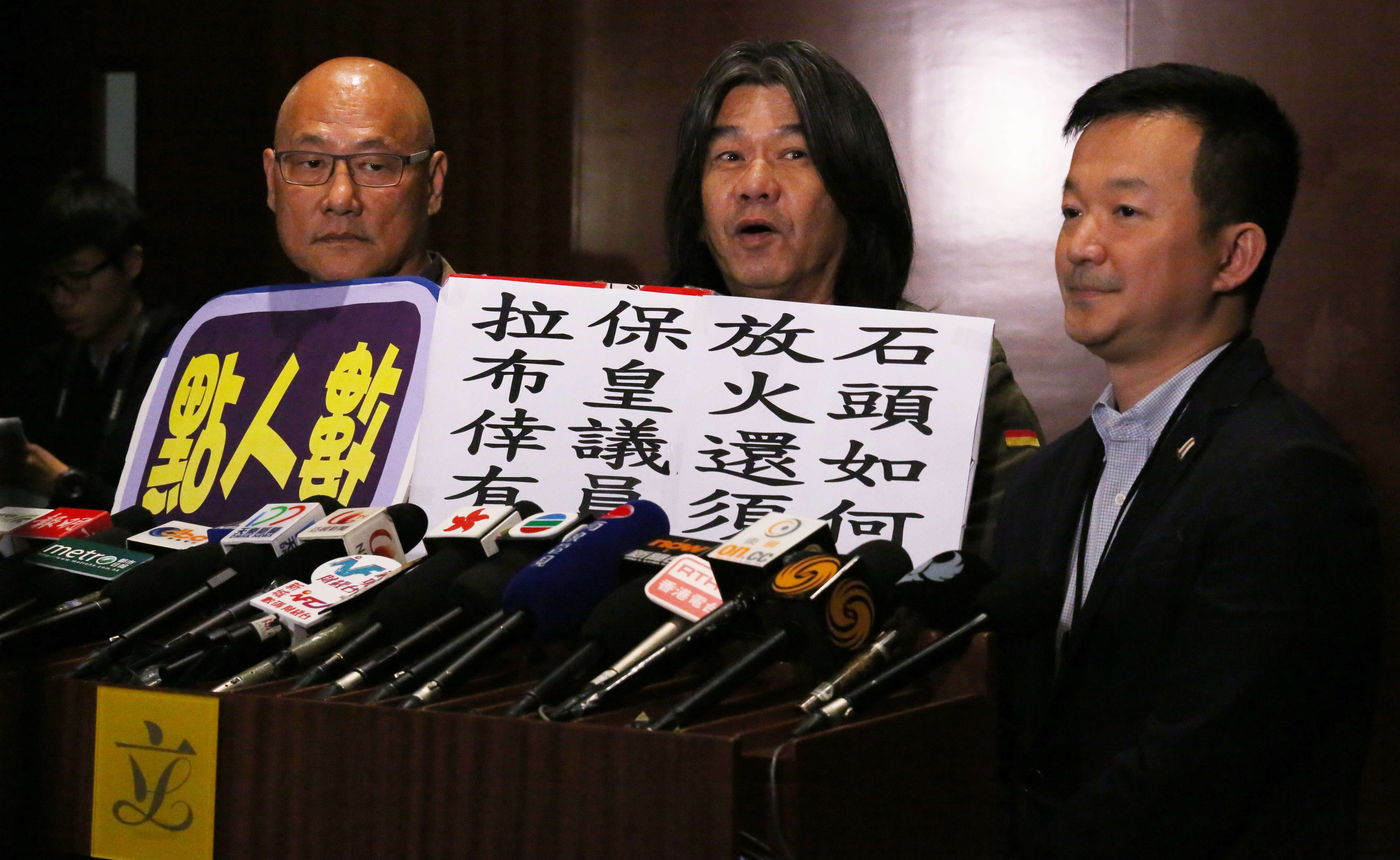 Albert Chan Wai-yip (left), "Long Hair" Leung Kwok-hung, and Raymond Chan Chi-chuen addressing the media after a Legco meeting on the copyright bill in January. Photo: Nora Tam