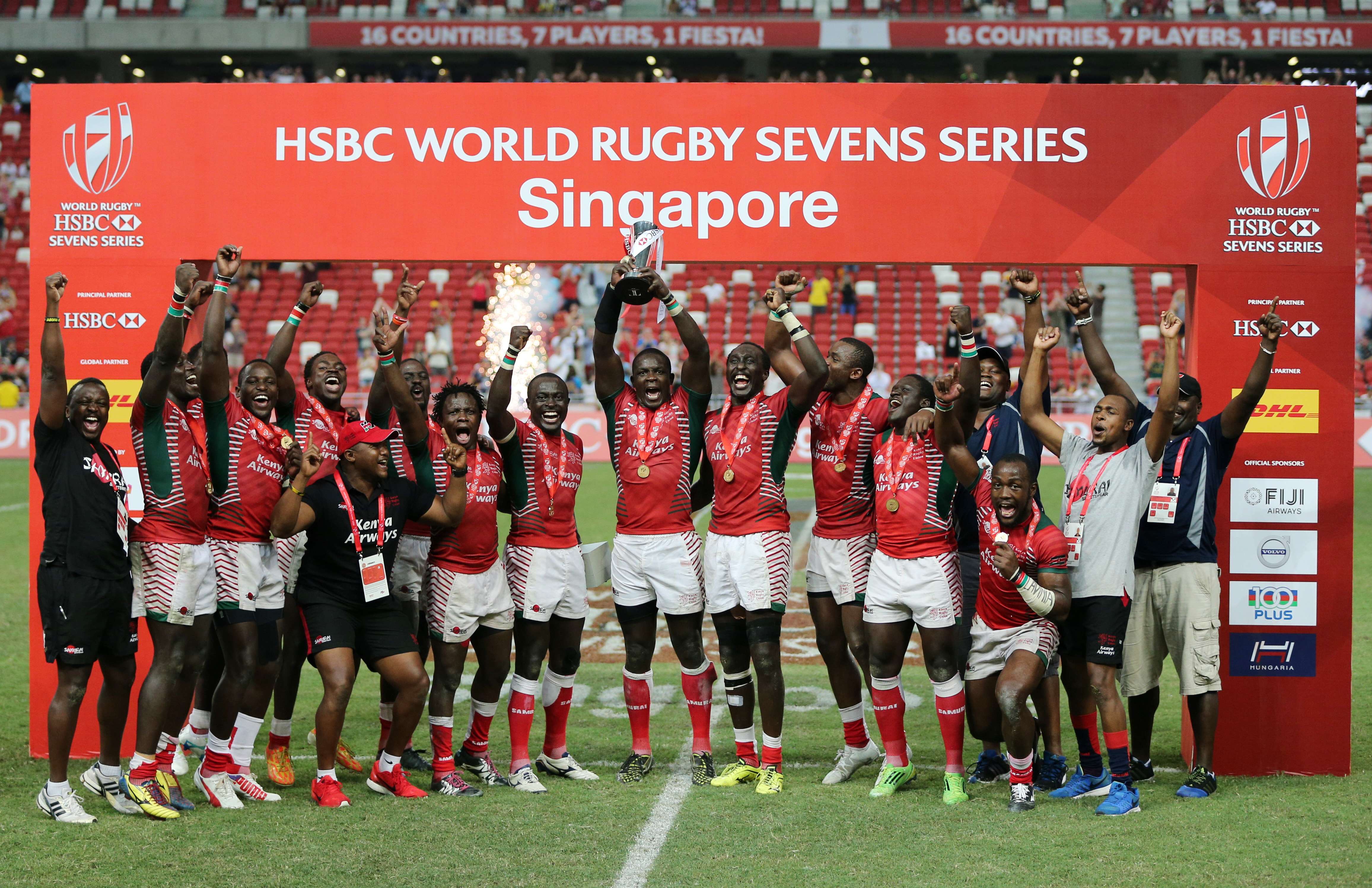 Kenyan players celebrate with the trophy after winning the 2016 Singapore Sevens on Sunday. Photo: Reuters