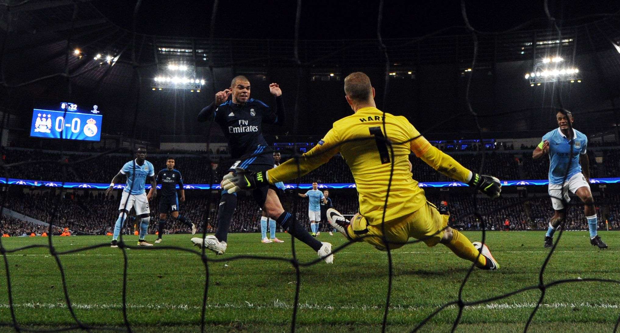 Manchester City goalkeeper Joe Hart saves a close-range shot from Real Madrid defender Pepe. Photo: AFP