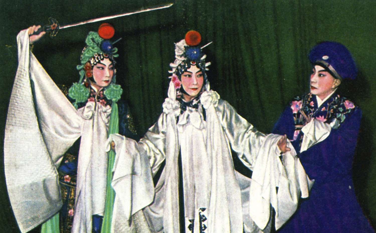 Mei Lanfang (centre) and son Mei Baojiu (left) with Peking opera master Yu Zhenfei in a performance of the Broken Bridge.