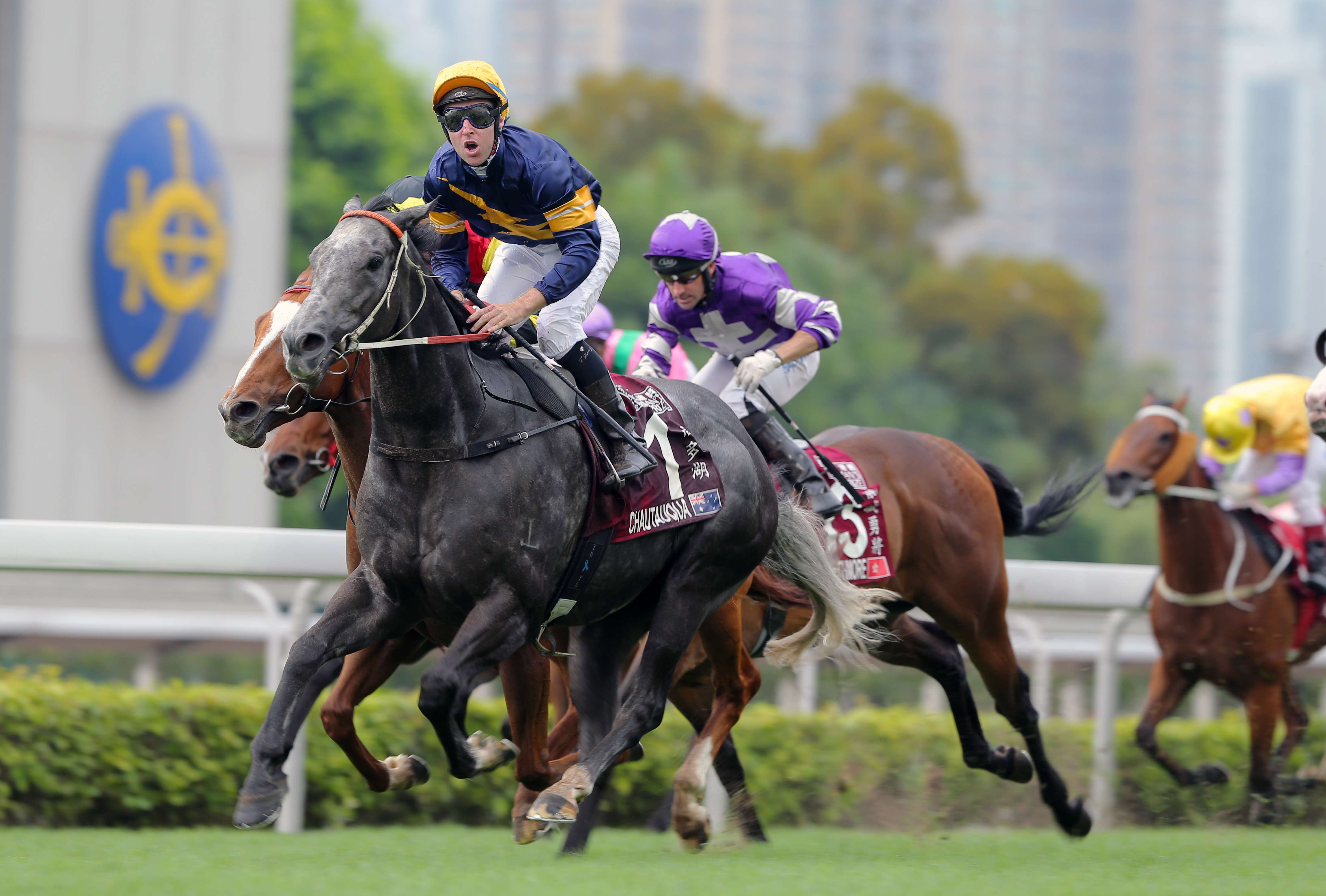Tommy Berry celebrates aboard Chautauqua after winning the Chairman's Sprint Prize on Sunday. The Jockey Club has no plans to change the format of the race. Photo: Kenneth Chan