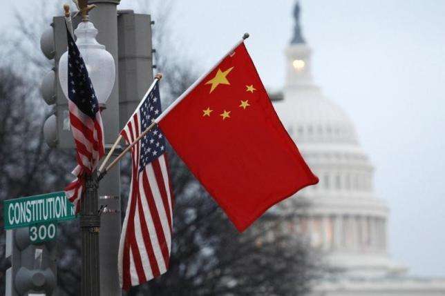 A file picture of the United States’ and China’s flags flying in Washington during a trip to the US capital by President Xi Jinping. Photo: Reuters