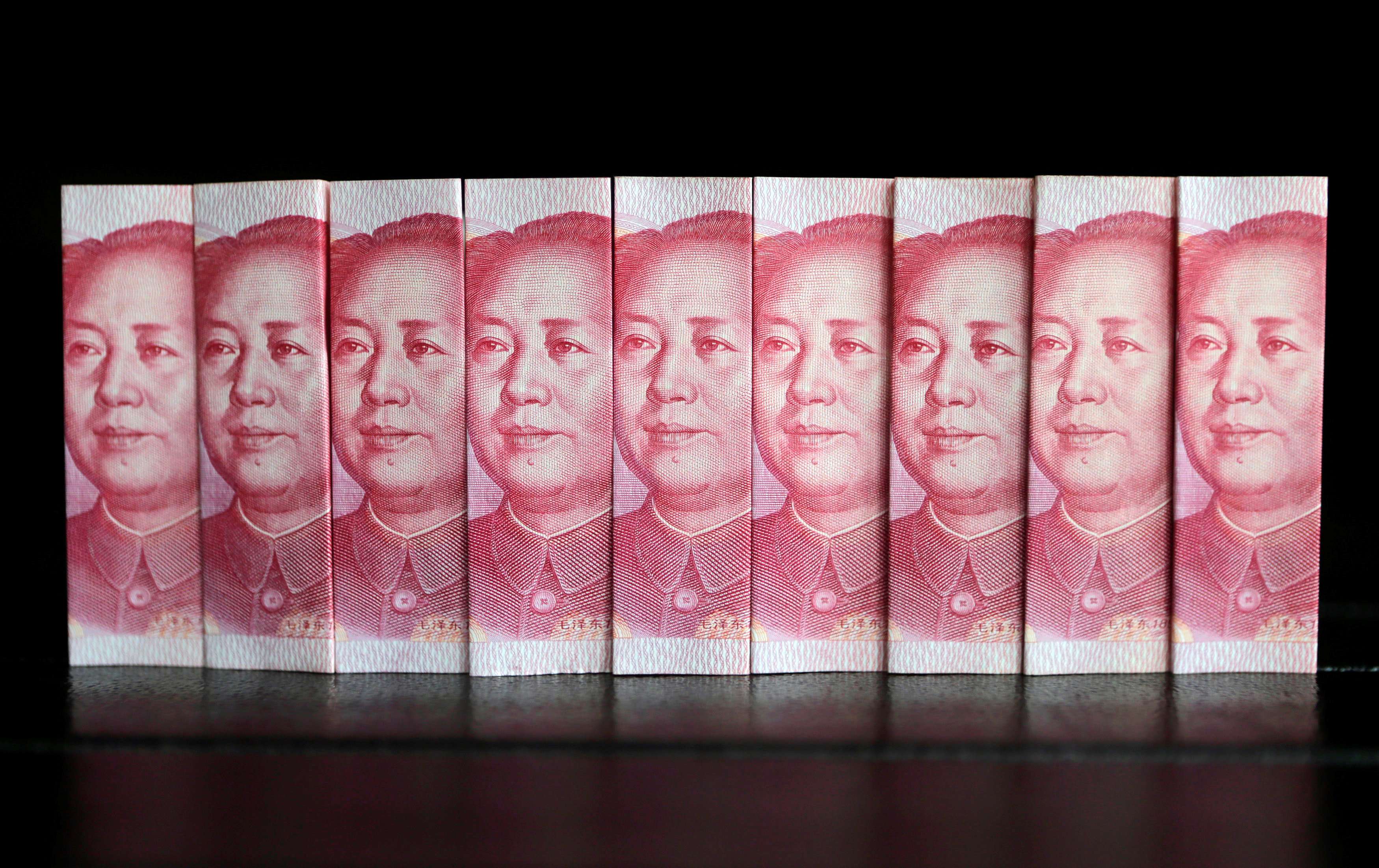 Chinese 100 yuan banknotes Photo; Reuters, Jason Lee