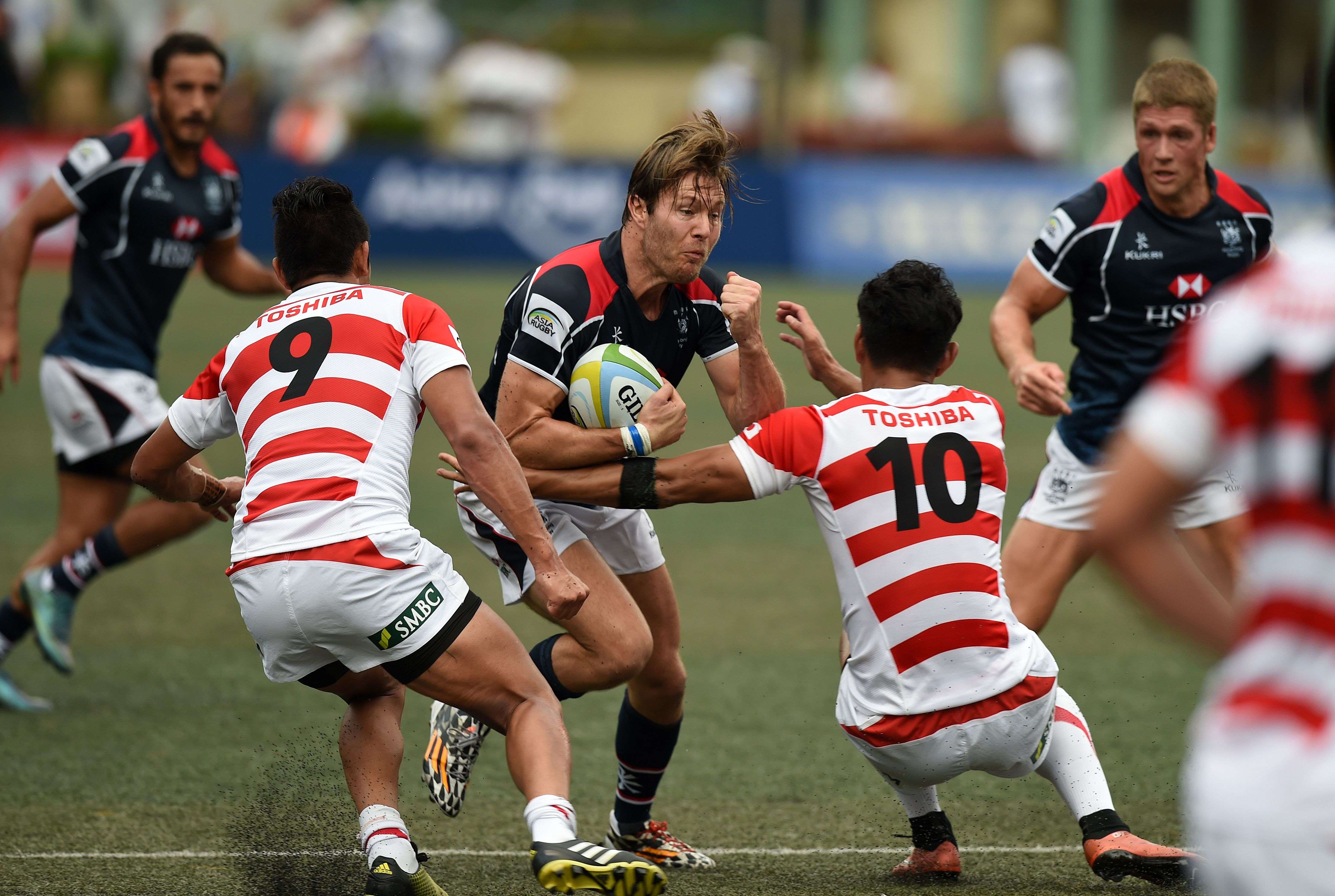 Ryan Meacheam tries to break through the Japan defence during last weekend’s 38-3 defeat at Hong Kong Football Club. Photos: AFP