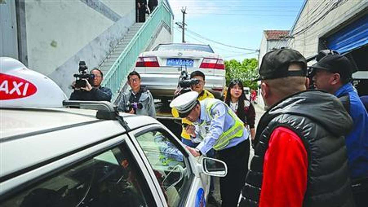 Fake taxis with forged licence plates, rigged fare meters seized in  Shanghai crackdown | South China Morning Post