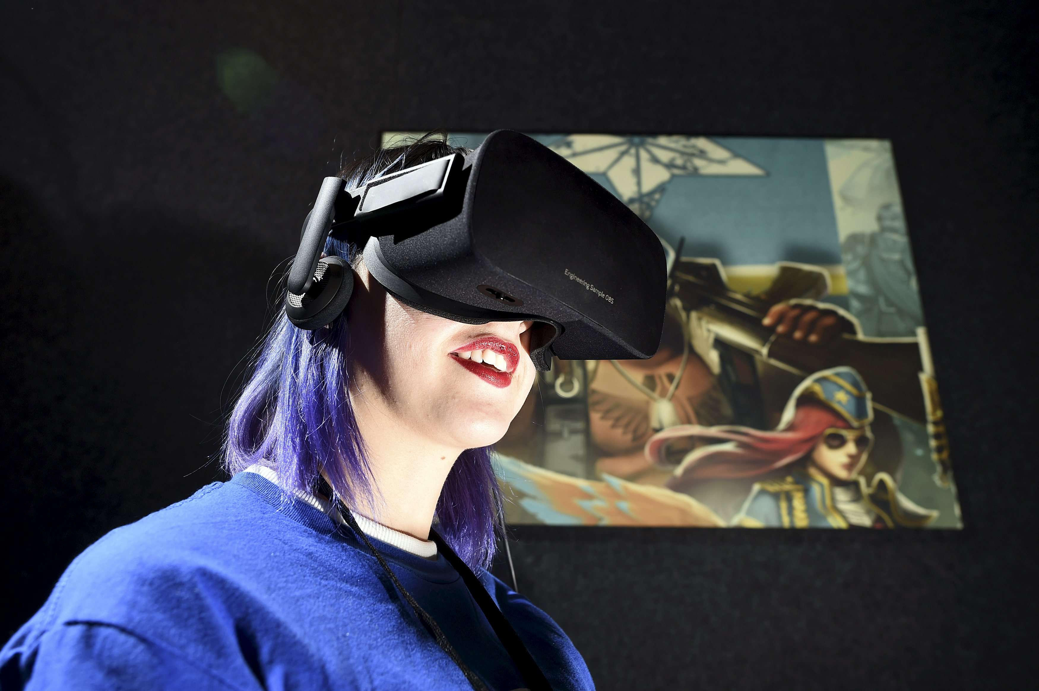 Kaitlyn Innis, a brand ambassador for Oculus, plays "Dragon Front" by High Voltage Software during the Oculus Game Day VR event in San Francisco, California on March 15, 2016. Photo: Reuters