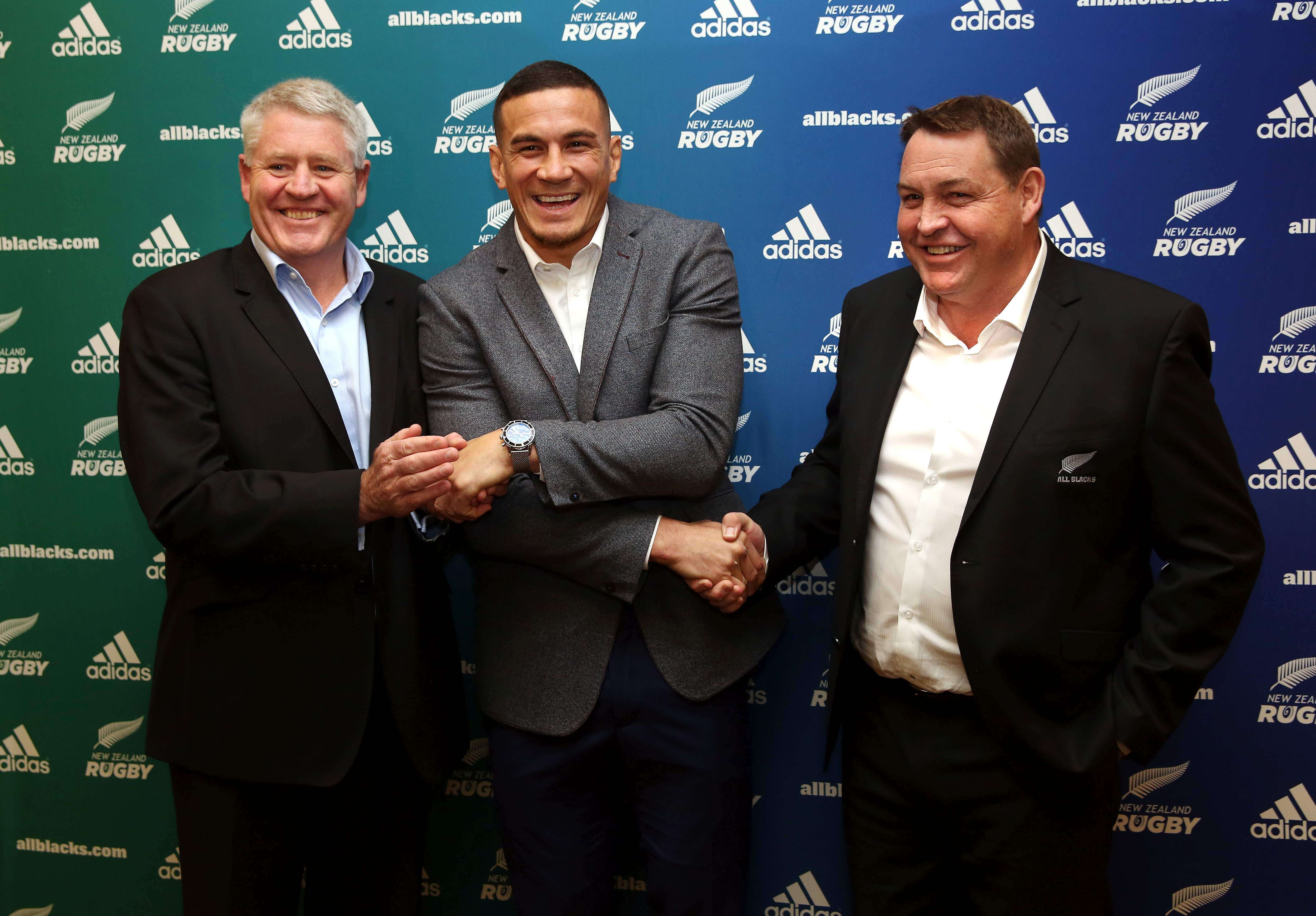 All Black Sonny Bill Williams with New Zealand Rugby Union chief executive Steve Tew (left) and All Blacks coach Steve Hansen after it was announced Sonny Bill had signed a three-year deal with the union. Photo: AFP