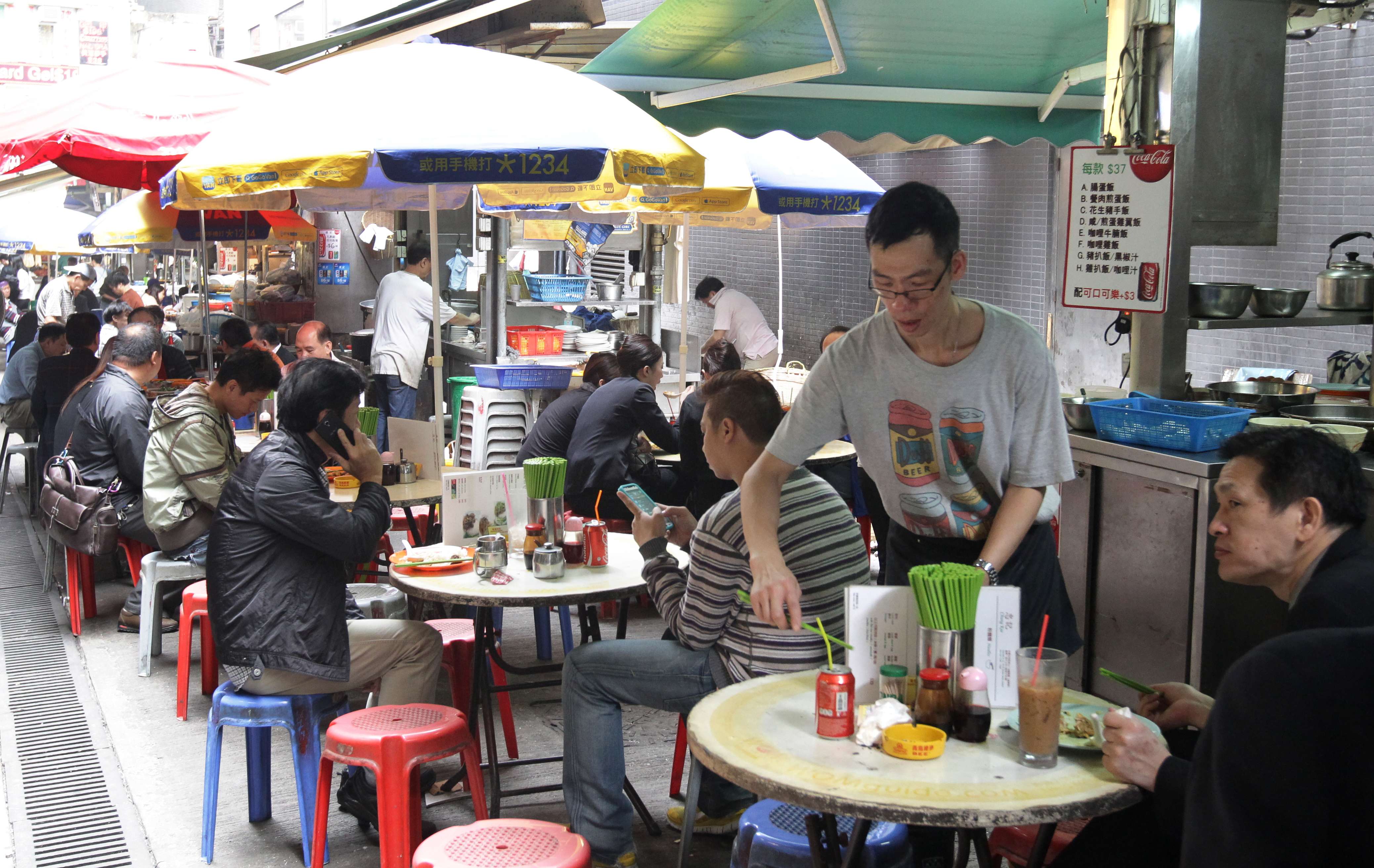 Hong Kong’s dai pai dong are much loved by residents and tourists alike. Photo: Dickson Lee