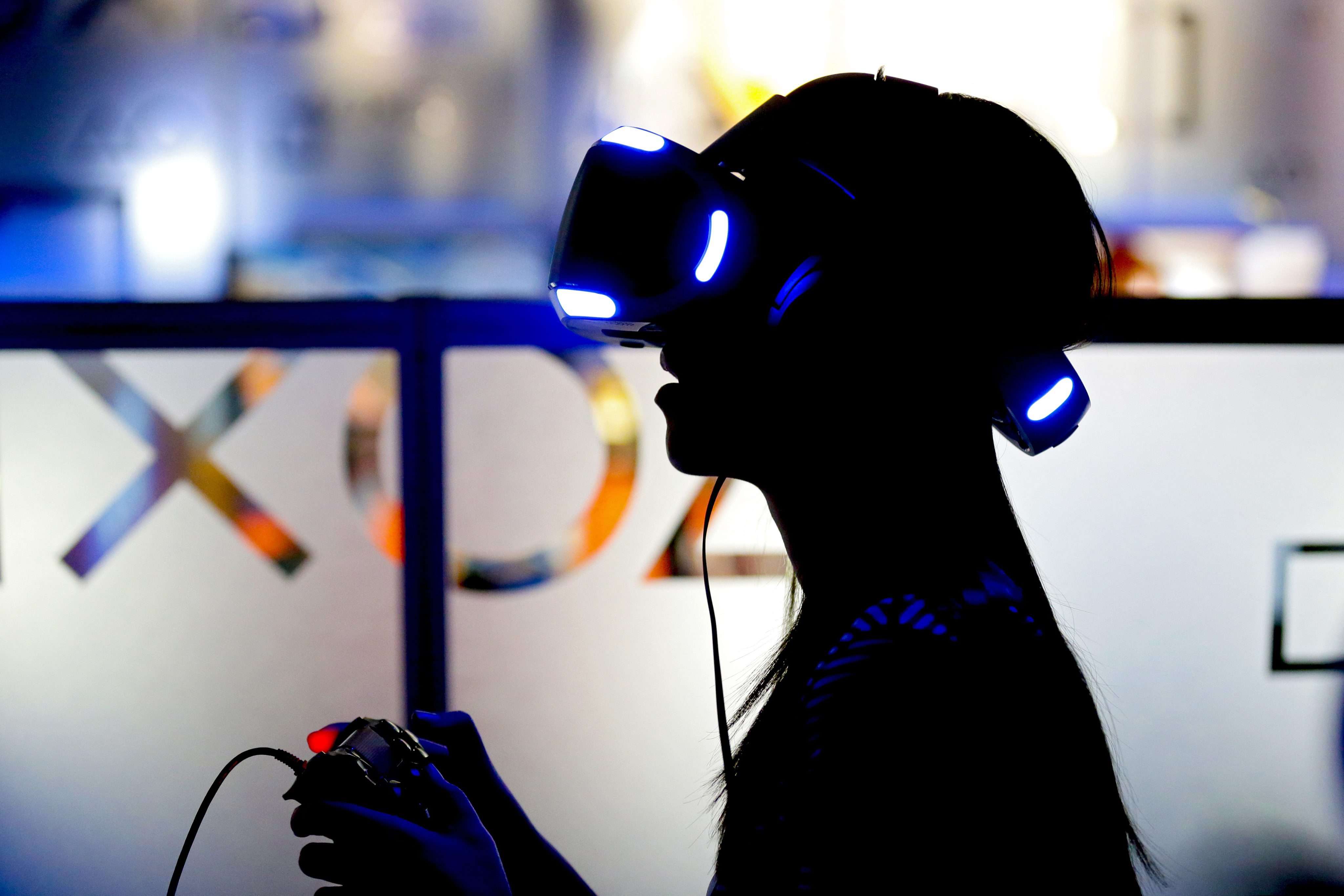 A gamer wears a Virtual Reality (VR) game console during the 2016 Taipei game show in Taiwan. Photo EPA, Ritchie B. Tongo
