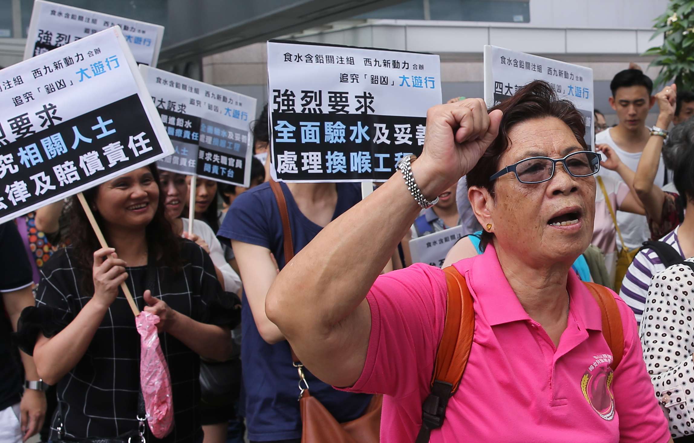 Protesters demand action on tainted water. This means higher water tariffs are likely to stay off the table. Photo: Sam Tsang