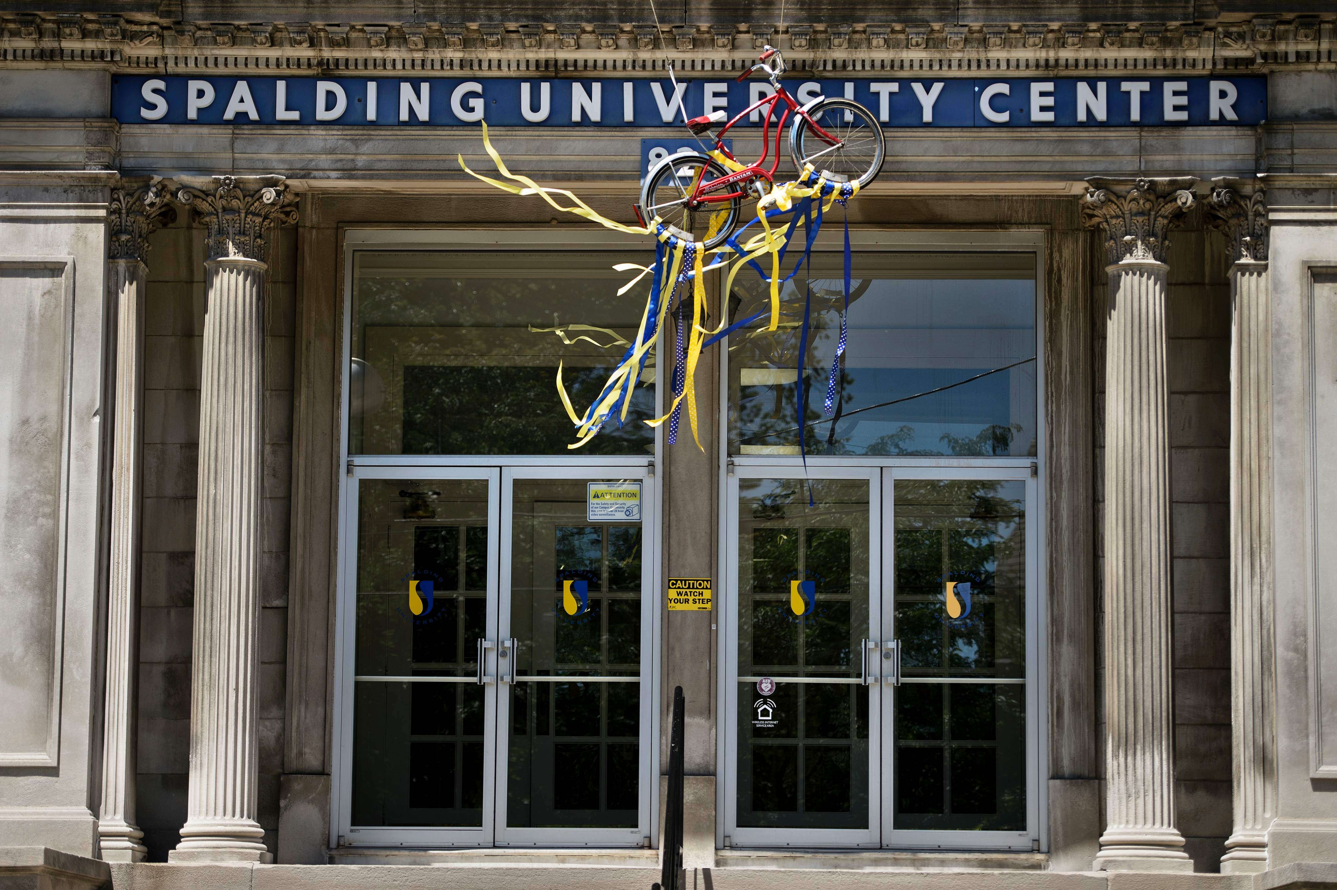 A bike hangs outside Spalding University Centre where boxing legend Muhammad Ali began his interest in boxing after having his bike stolen. Photos: AFP