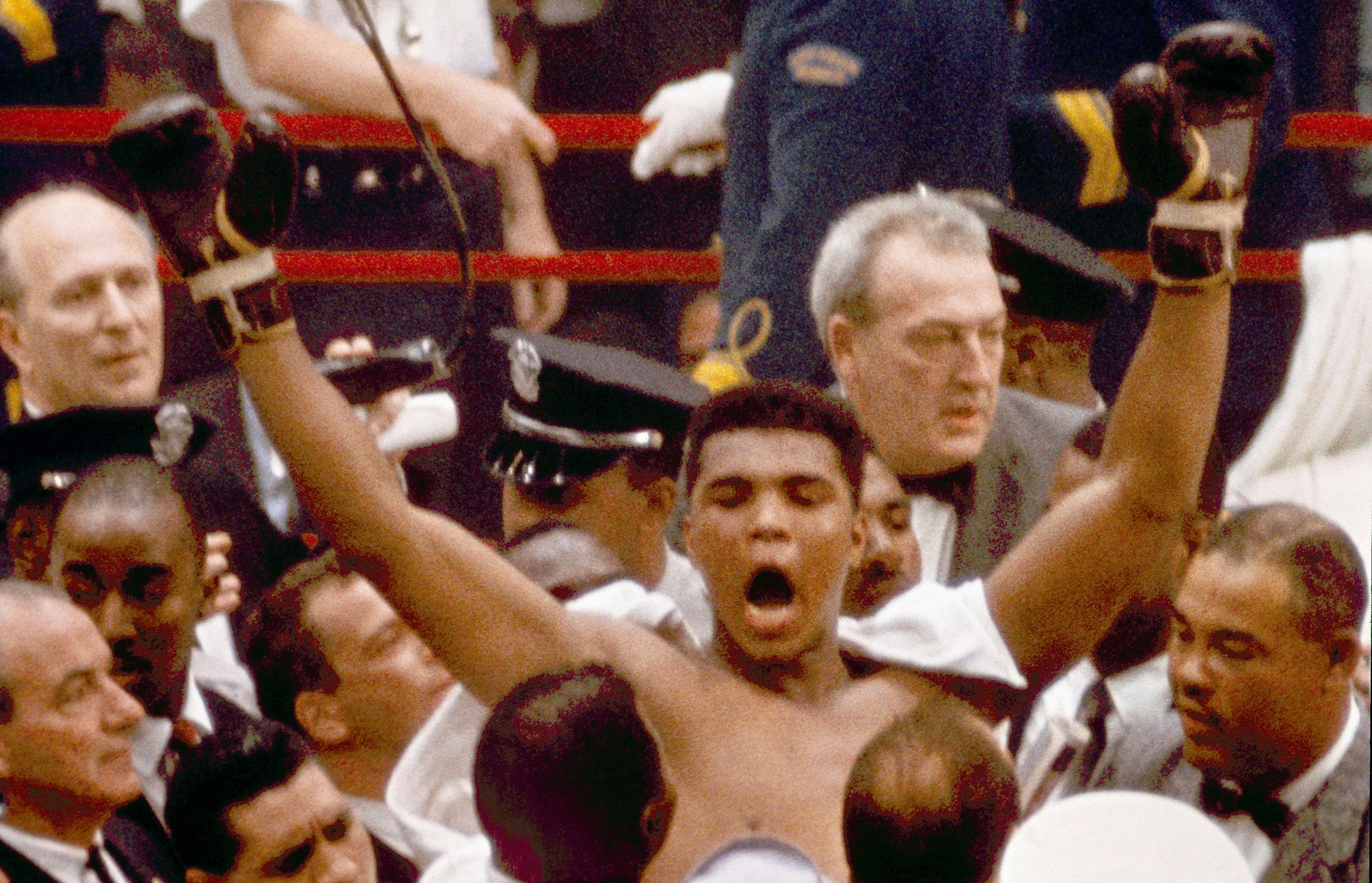 Muhammad Ali, or Cassius Clay at the time, strikes a familiar pose as he shouts "I am the greatest" after beating former heavyweight champion Sonny Liston in Miami Beach in 1964. Photo: AP