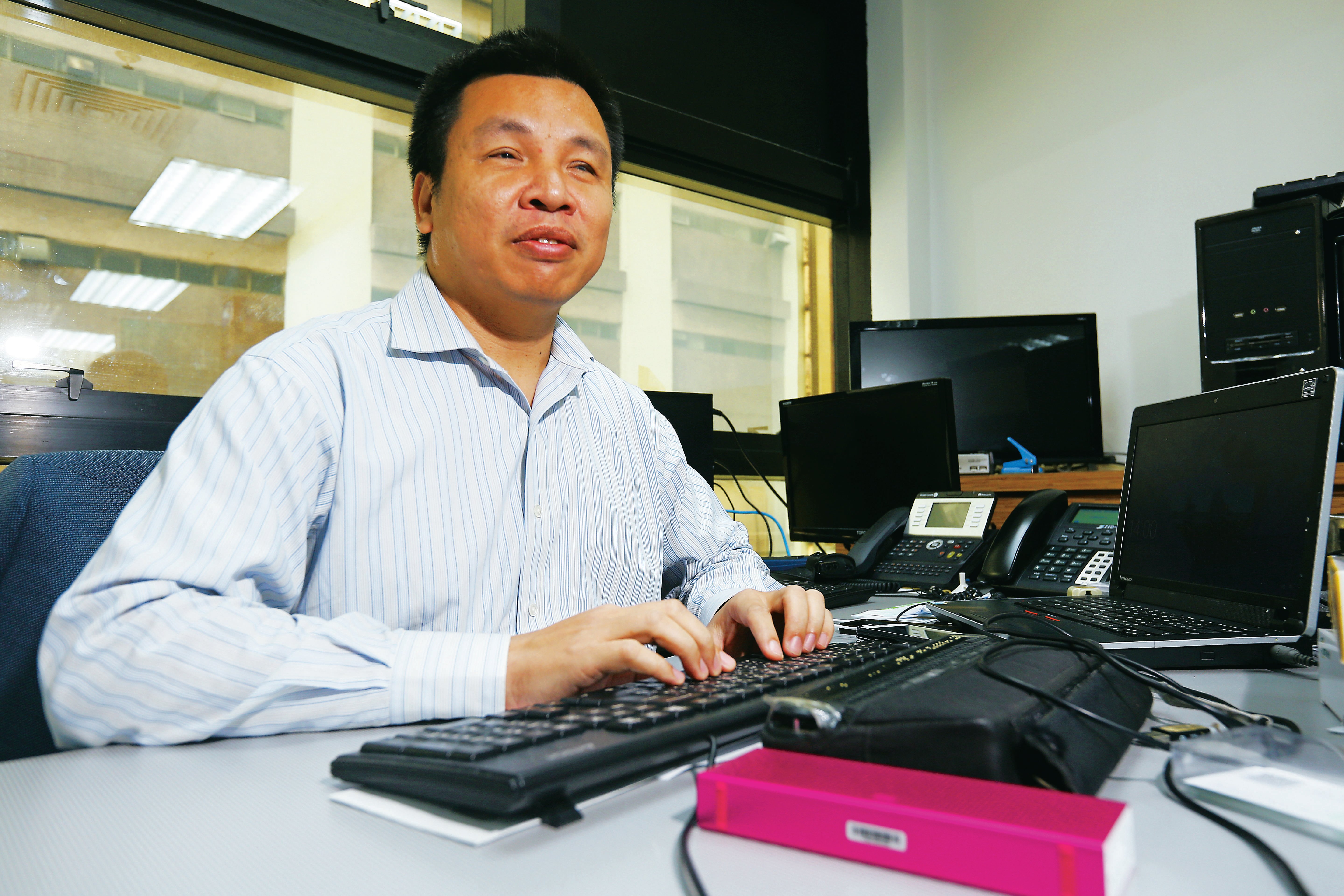Edward Yip feels an urge to connect blind people to the colourful world out there through technology. Photo: Edmond So