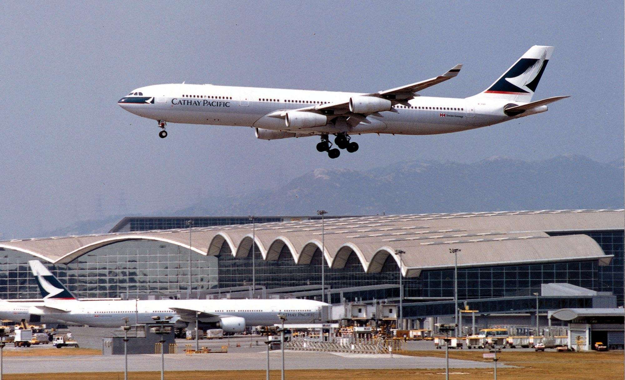 The planned airport construction fees on departing passengers, and higher landing fees for airlines, come at a testing time for the industry. Cathay Pacific Airways and Dragonair have already reported traffic drops for two consecutive months in April and May. Photo: AP