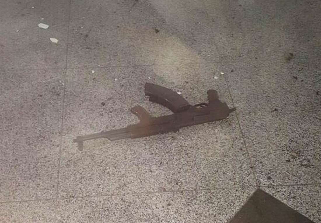 A weapon belonging to a dead suicide bomber lays on the floor at Ataturk airport. Photo: 140journo/Reuters