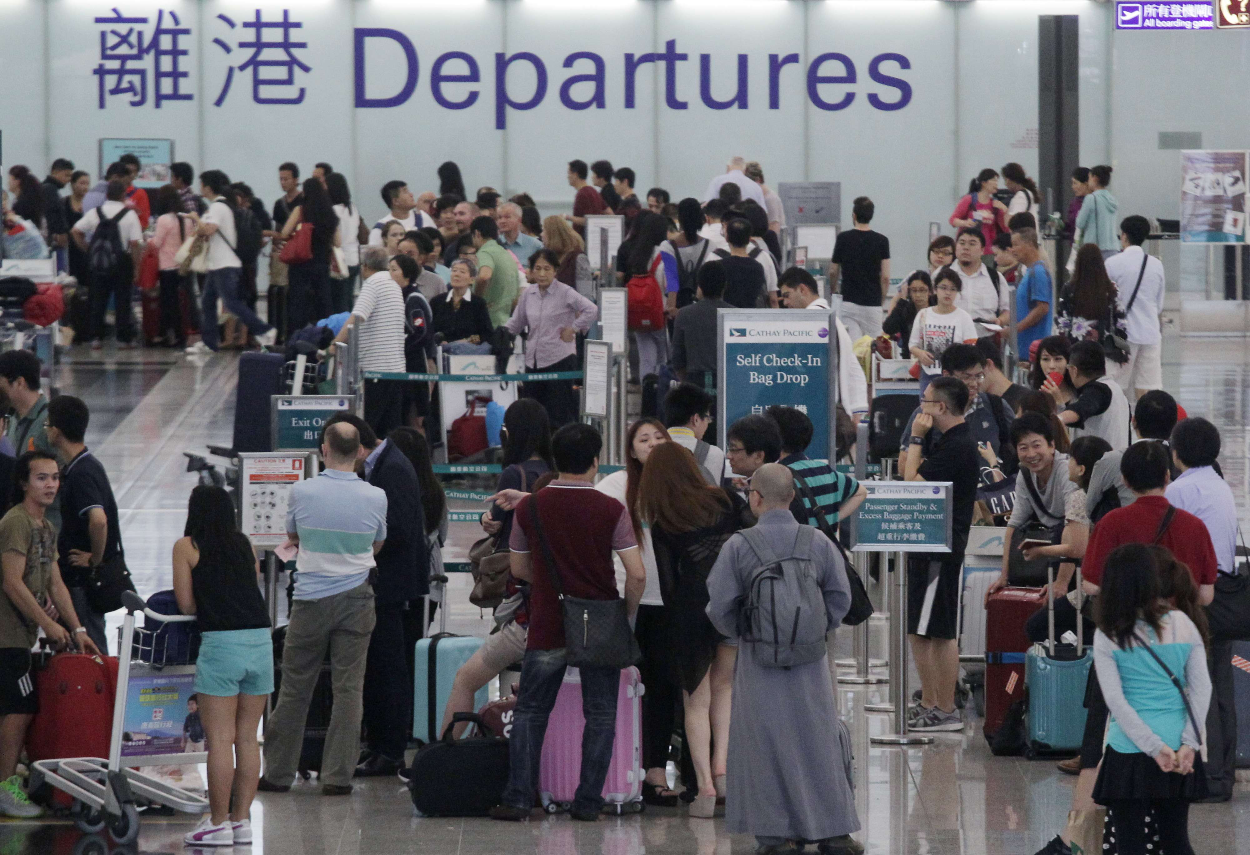 Tourists waiting at Hong Kong International Airport Photo: SCMP