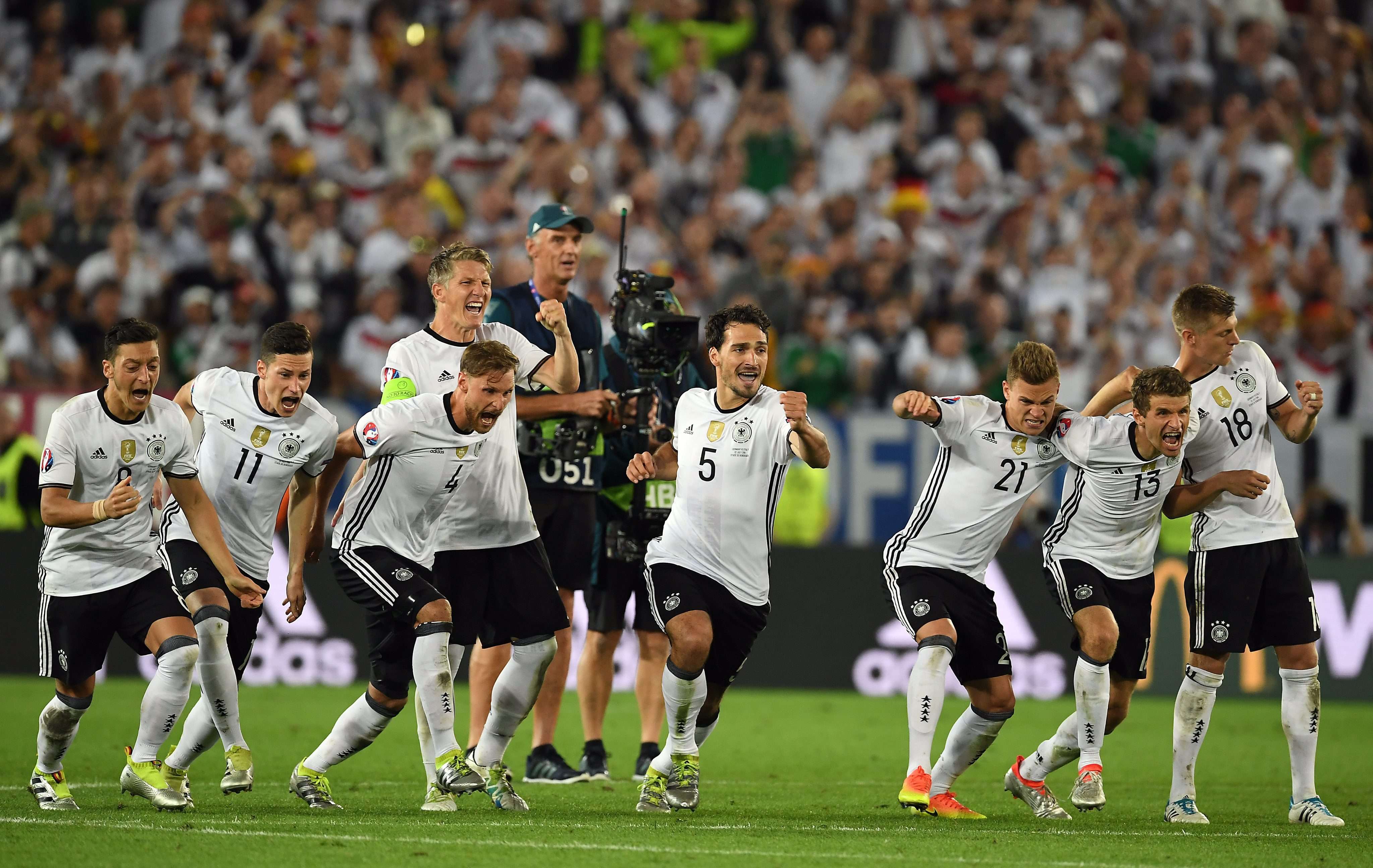 Germany players react after winning the penalty shoot-out EPA