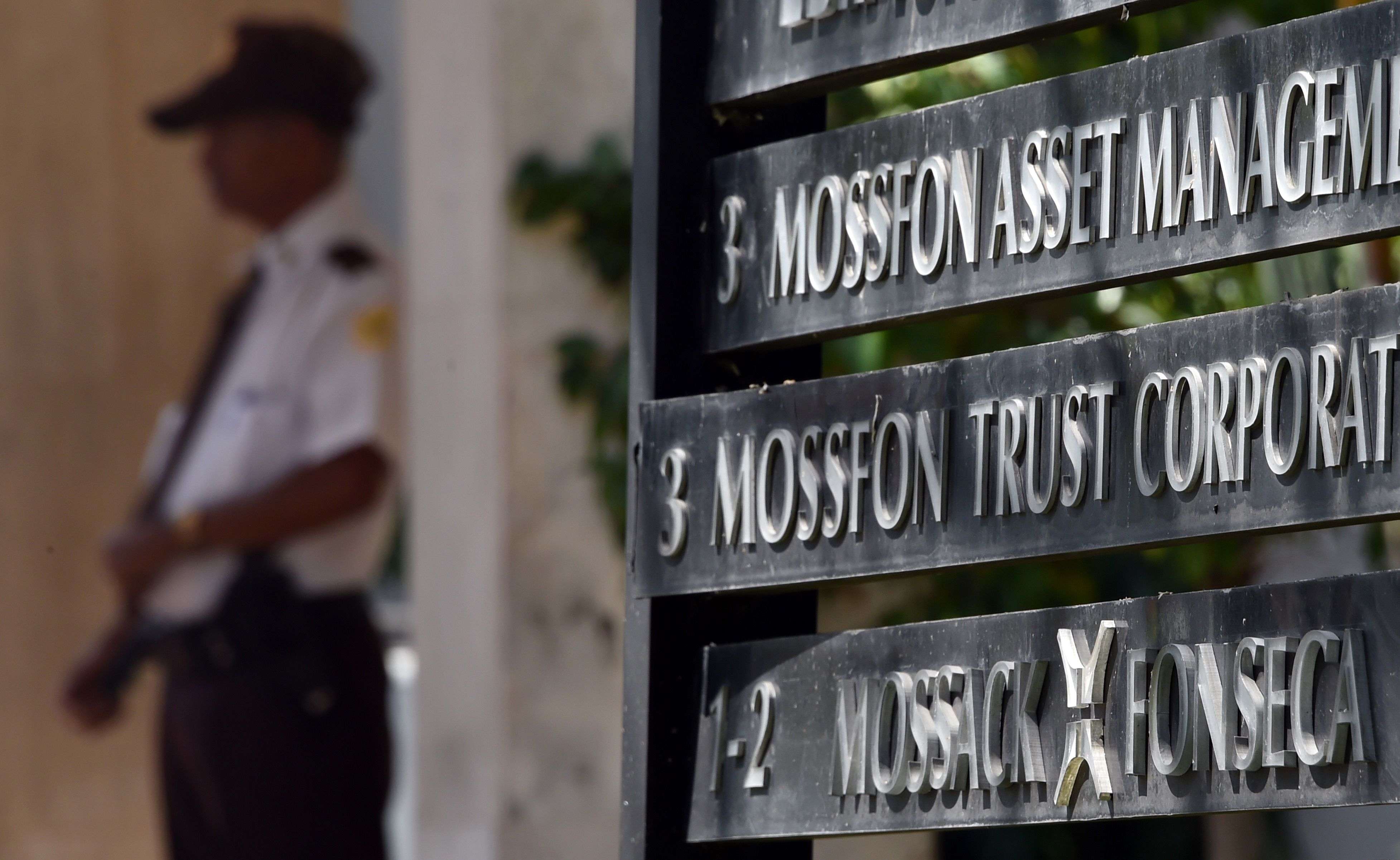 A private security guard stands outside the building where Panama-based Mossack Fonseca law firm is based, in Panama City, on April 5, 2016. A massive leak - coming from Mossack Fonseca - of 11.5 million tax documents exposed the secret offshore dealings of world leaders, celebrities and institutions. Photo: AFP