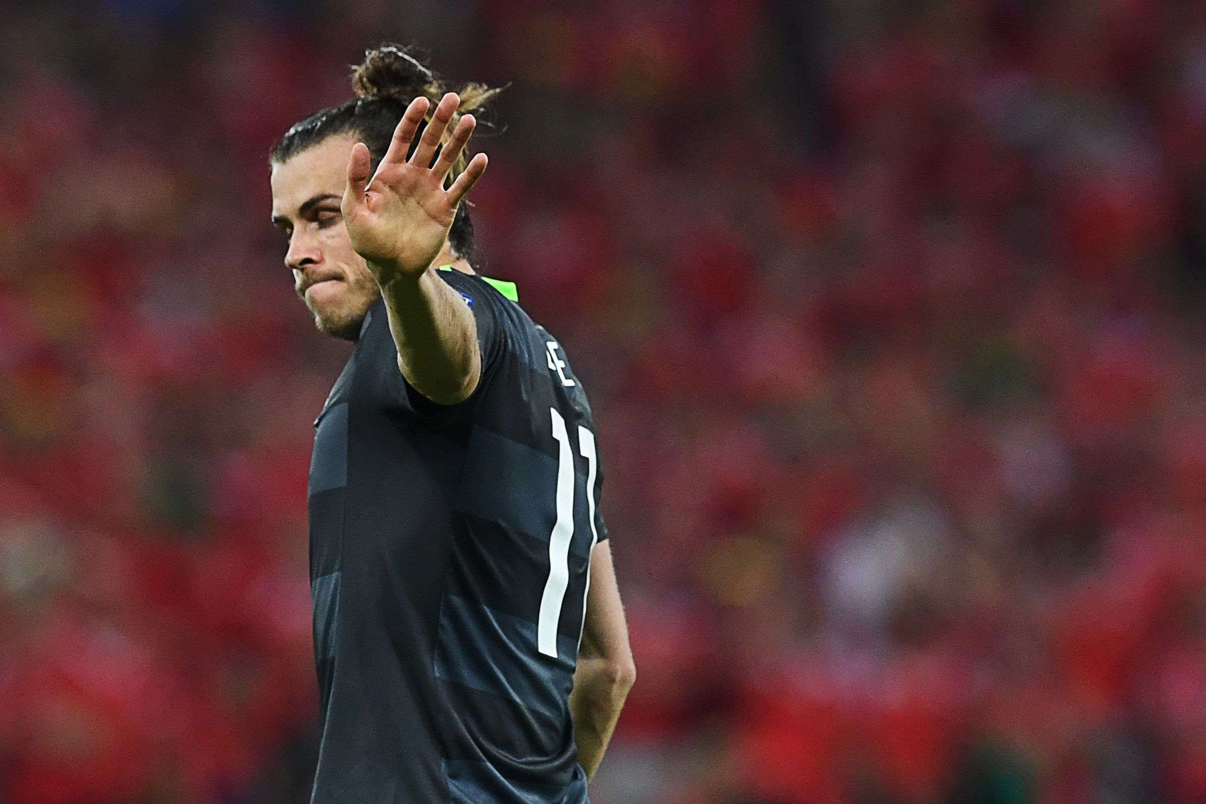 Gareth Bale waves farewell to the fans. Photo: AFP