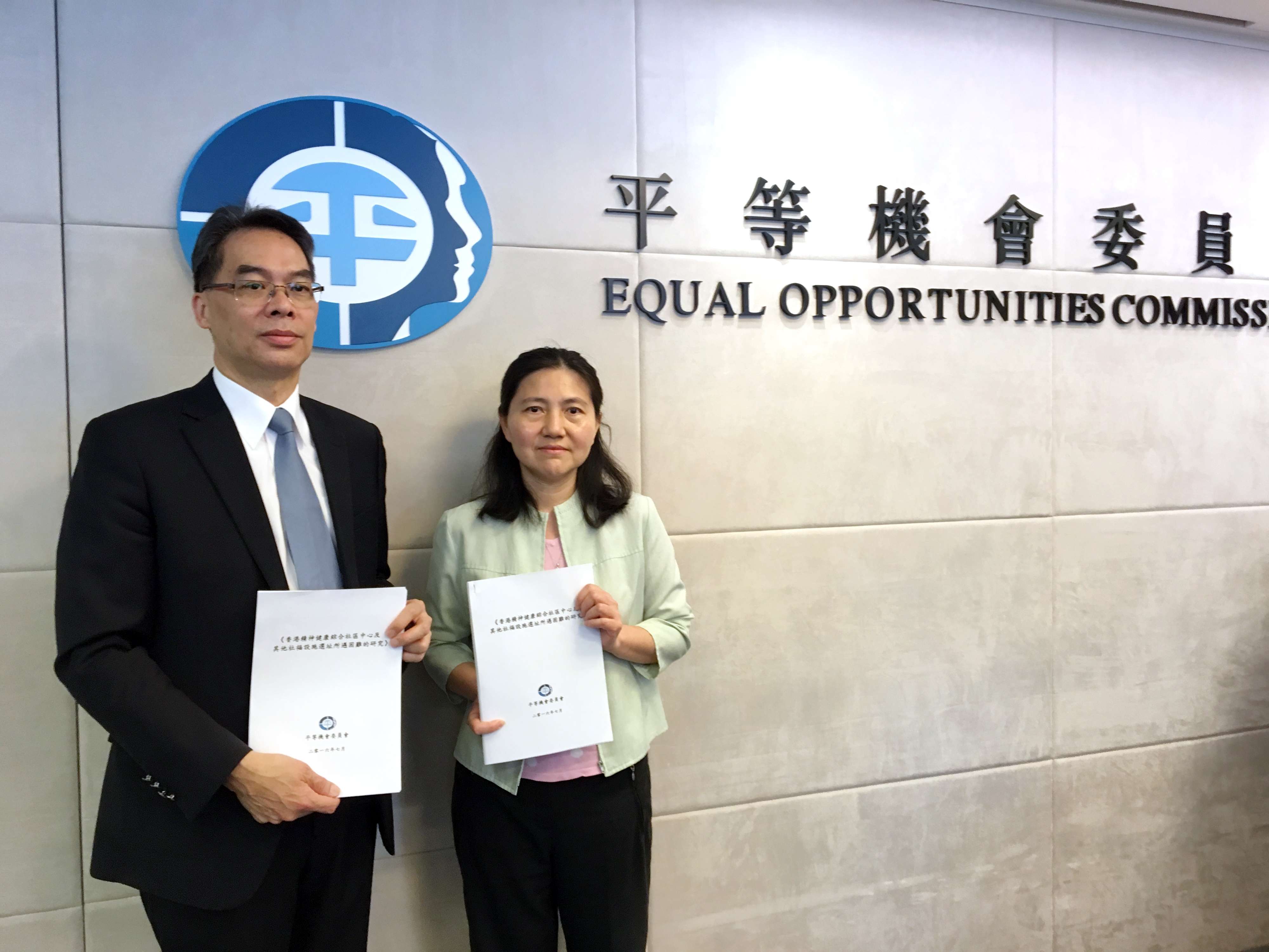 A study on psychological health was presented by Dr Ferrick Chung Chu-man (left), director of policy, research and training at EOC, and Kitty Lam Kit-yee, senior policy research and training officer at EOC. Photo: SCMP Pictures