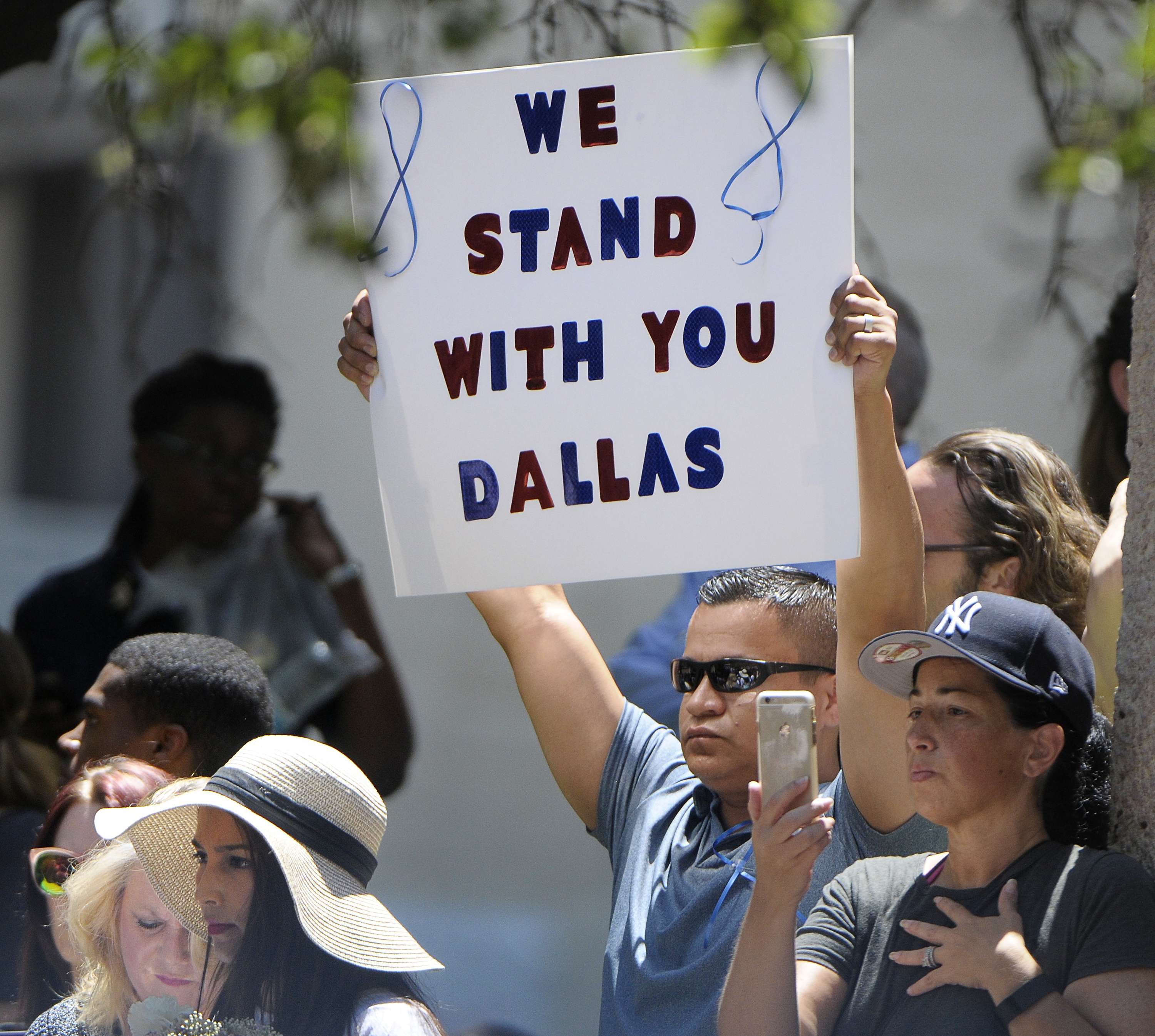 People attend an interfaith prayer event for the victims of the mass shooting that killed five police officers and wounded seven others, during a protest over recent police shootings in Minnesota and Louisiana, in Dallas, on July 8, 2016. Photo: TNS