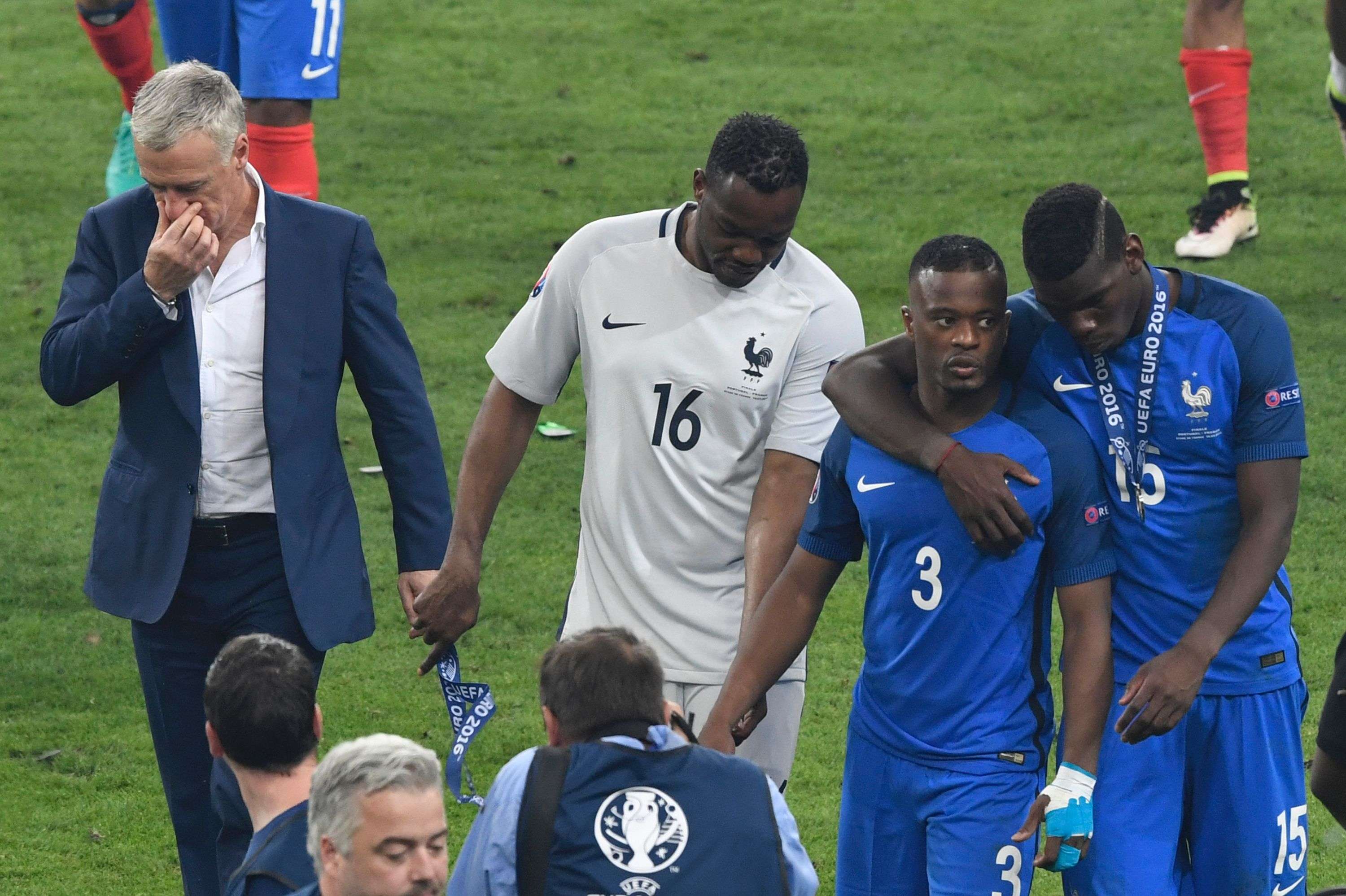 Didier Deschamps hangs his head after the final whistle. Photo: AFP