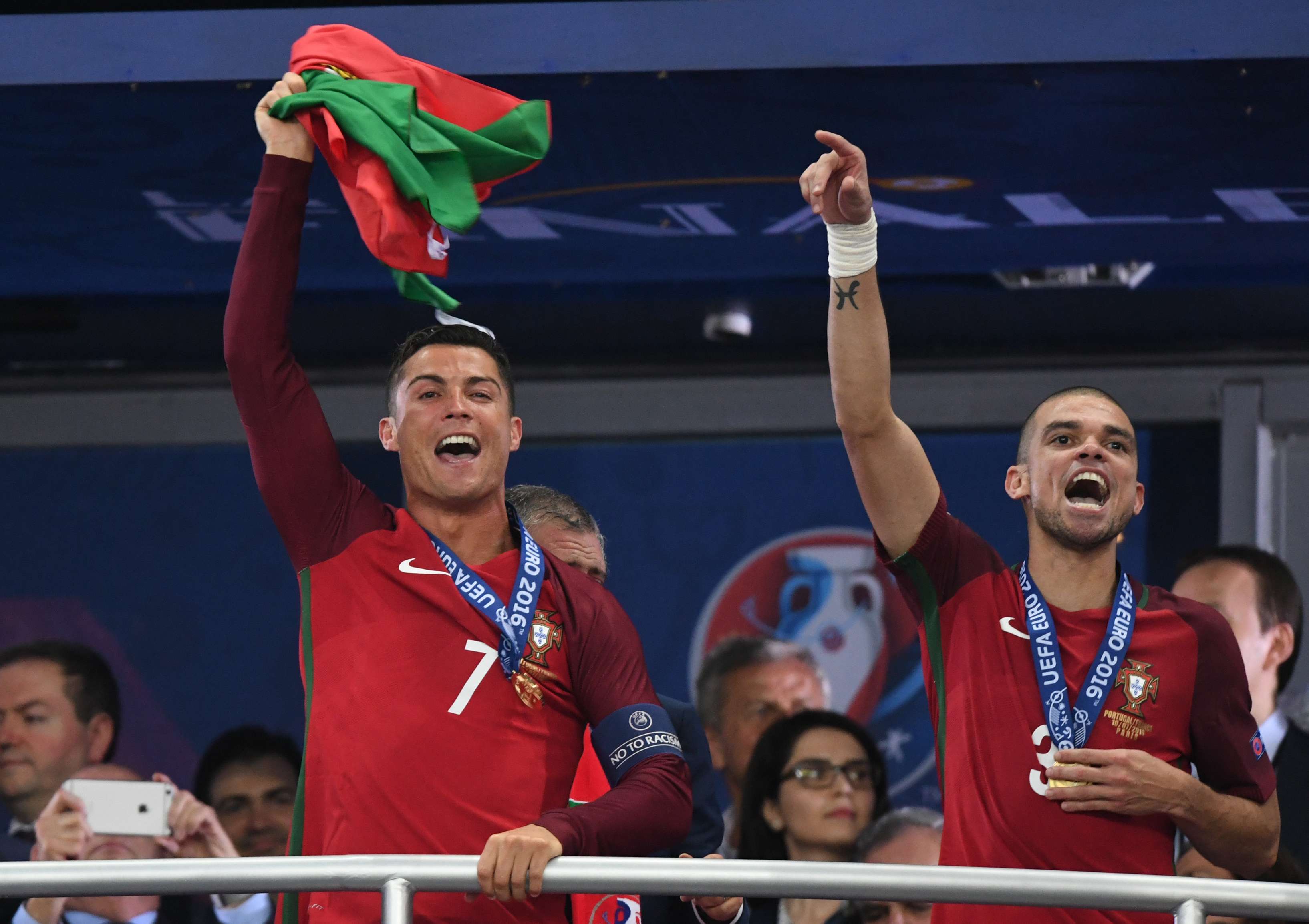 Cristiano Ronaldo and Pepe celebrate after beating France 1-0 in the Euro 2016 final in Paris. Photo: Xinhua