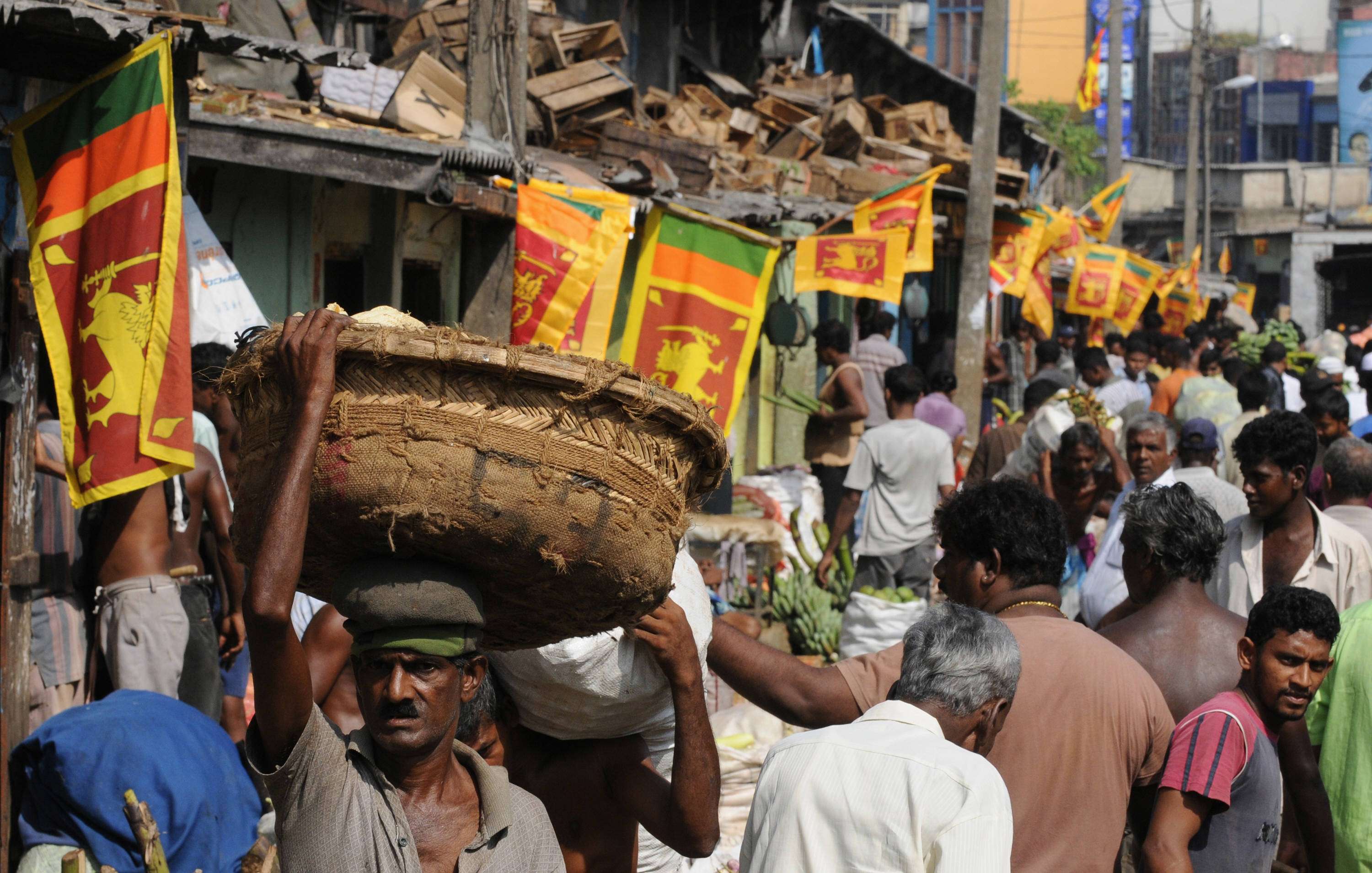 Sri Lankan national flags are seen at the main market in celebration of the country's military victory against Tamil Tiger rebels in Colombo. Picture: AFP