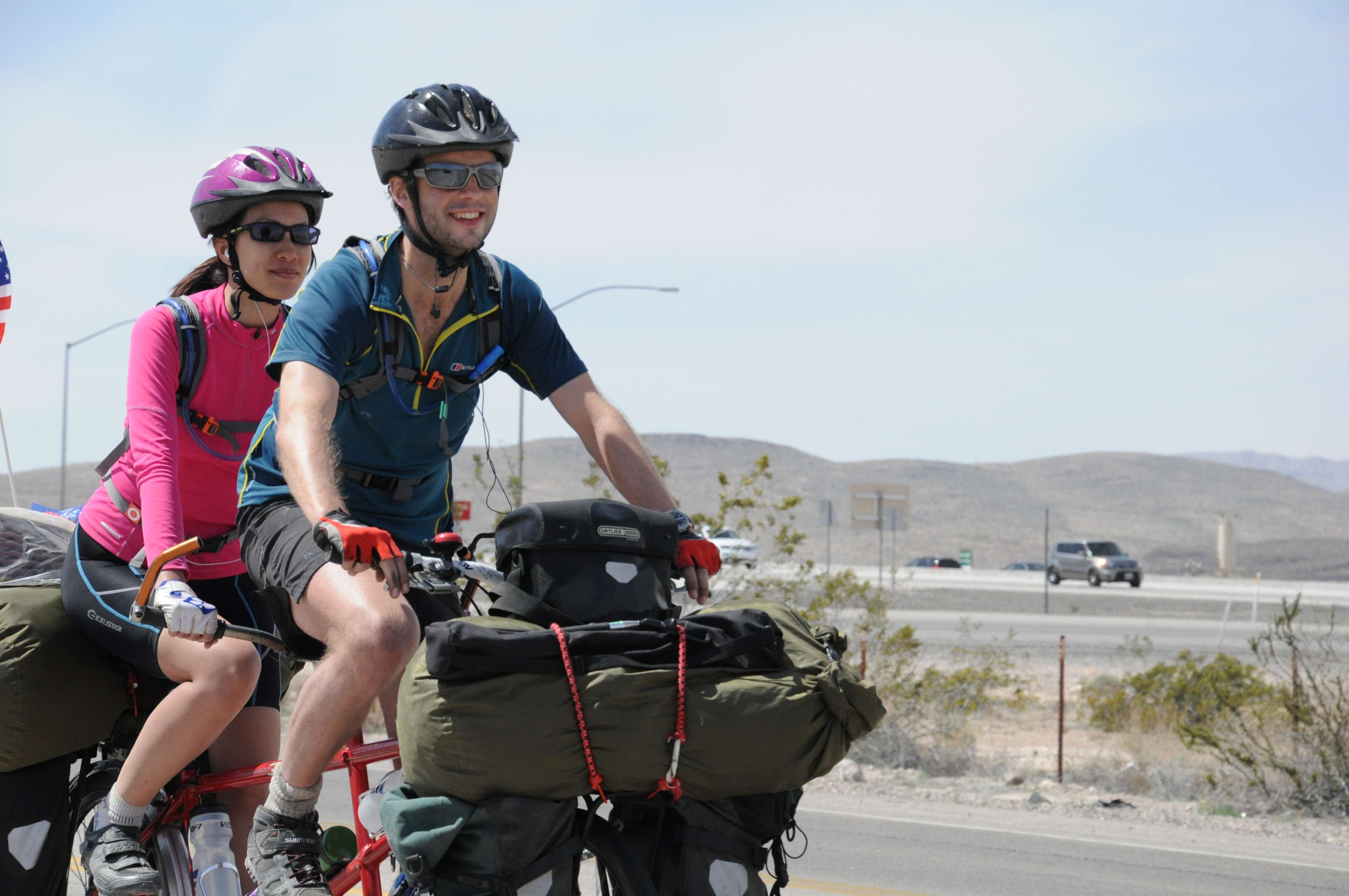 Christine and Rob Lilwall riding through the Las Vegas desert.