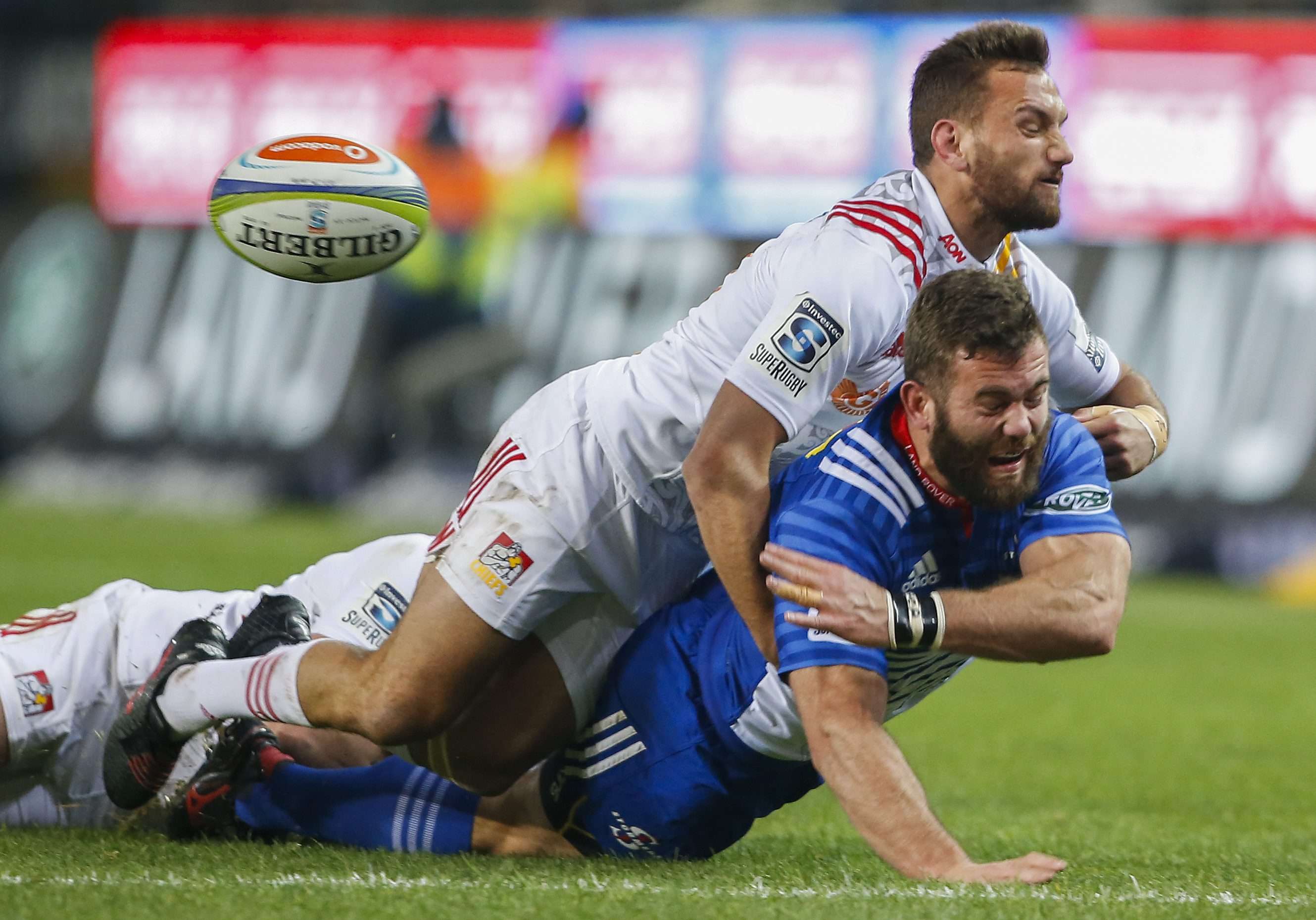 Stormers' Jaco Taute is tackled by Aaron Cruden of the Chiefs during their Super Rugby quarter-final on Saturday. Photo: EPA