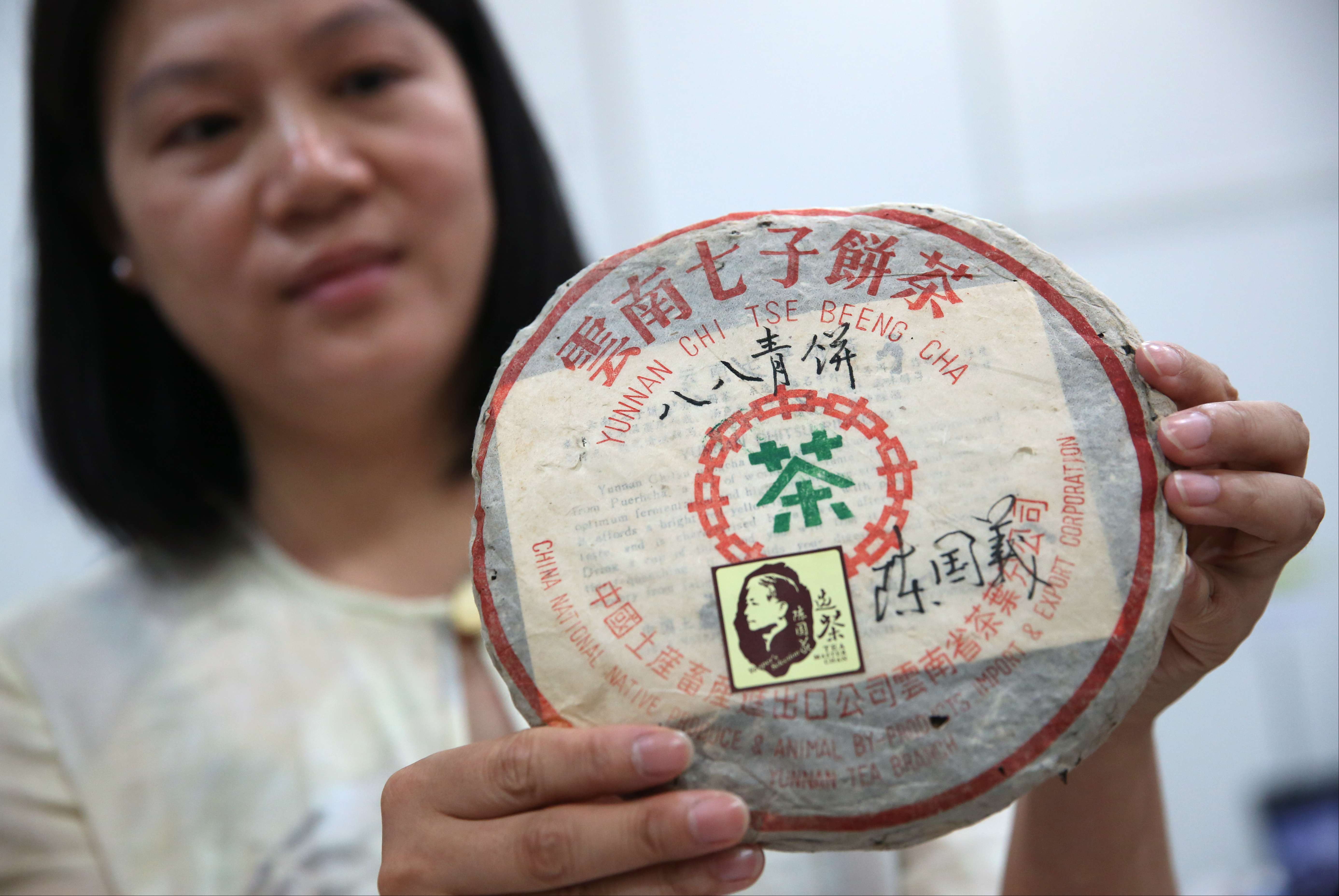 Director of The Best Tea House Company Limited Helen Fung poses for pictures with tea-leaves during the preview on HKTDC Food Expo which will be held on 11 - 15 Aug 2016 at HKCEC in Wan Chai. 27JUL16 SCMP/ Sam Tsang