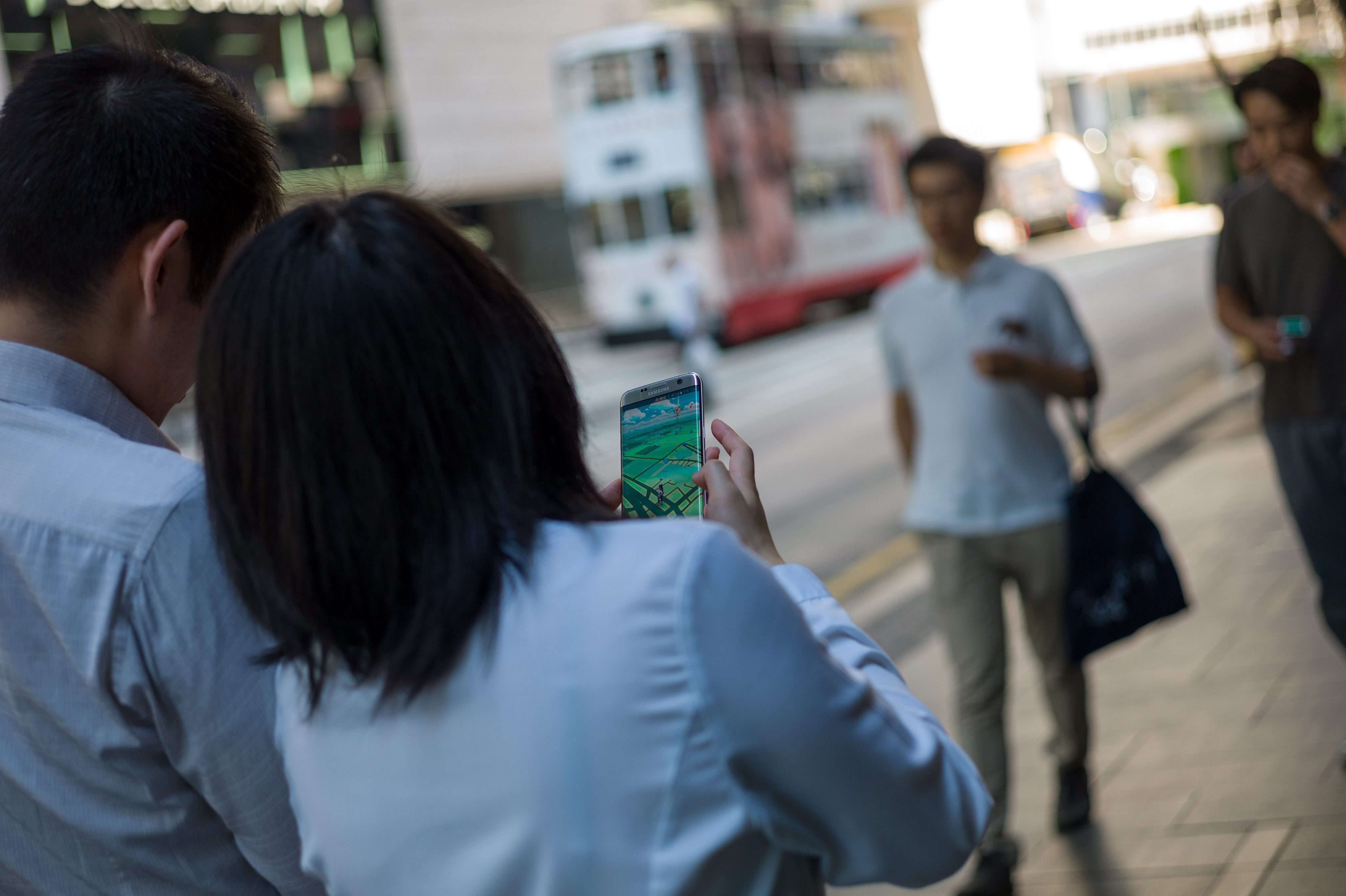 Pokémon Go players, on the first day of its release in Hong Kong on July 25. Photo: EPA