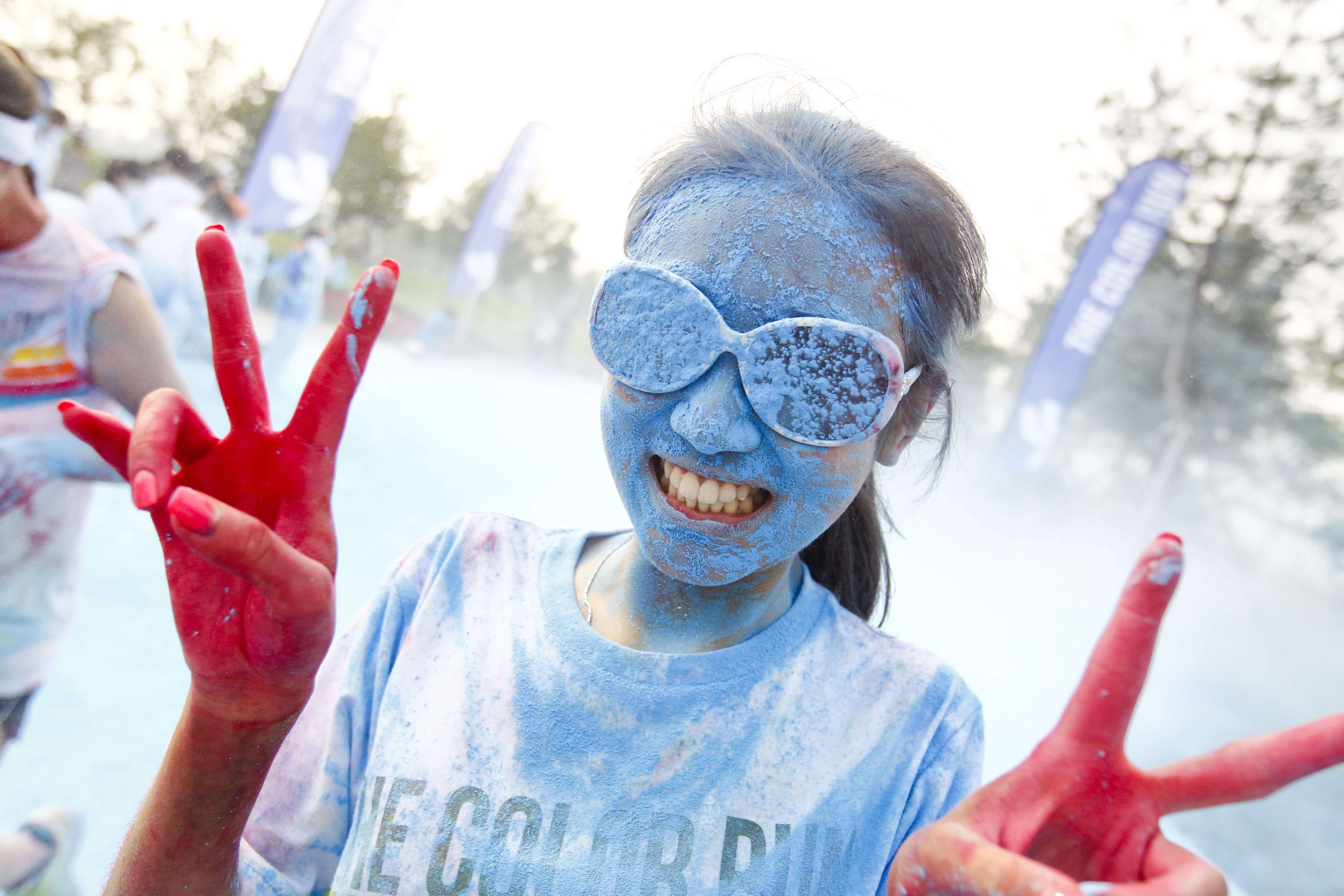 In the party-style Colour Run participants end up covered head-to-toe in brightly coloured powder. Photo: EPA