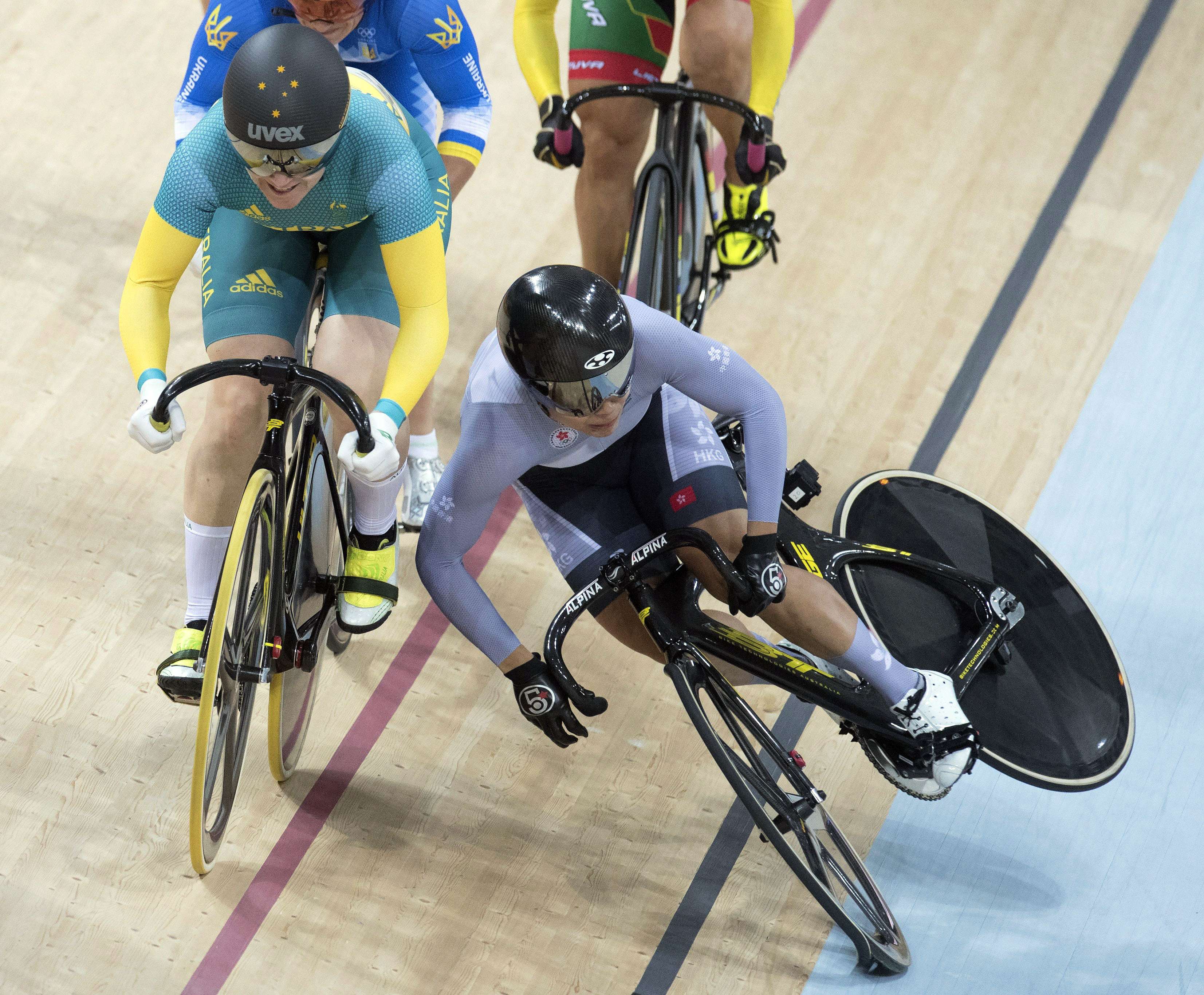 Sarah Lee crashes out of the keirin semi-finals at the Rio Olympic Velodrome. Photo: The Canadian Press via AP