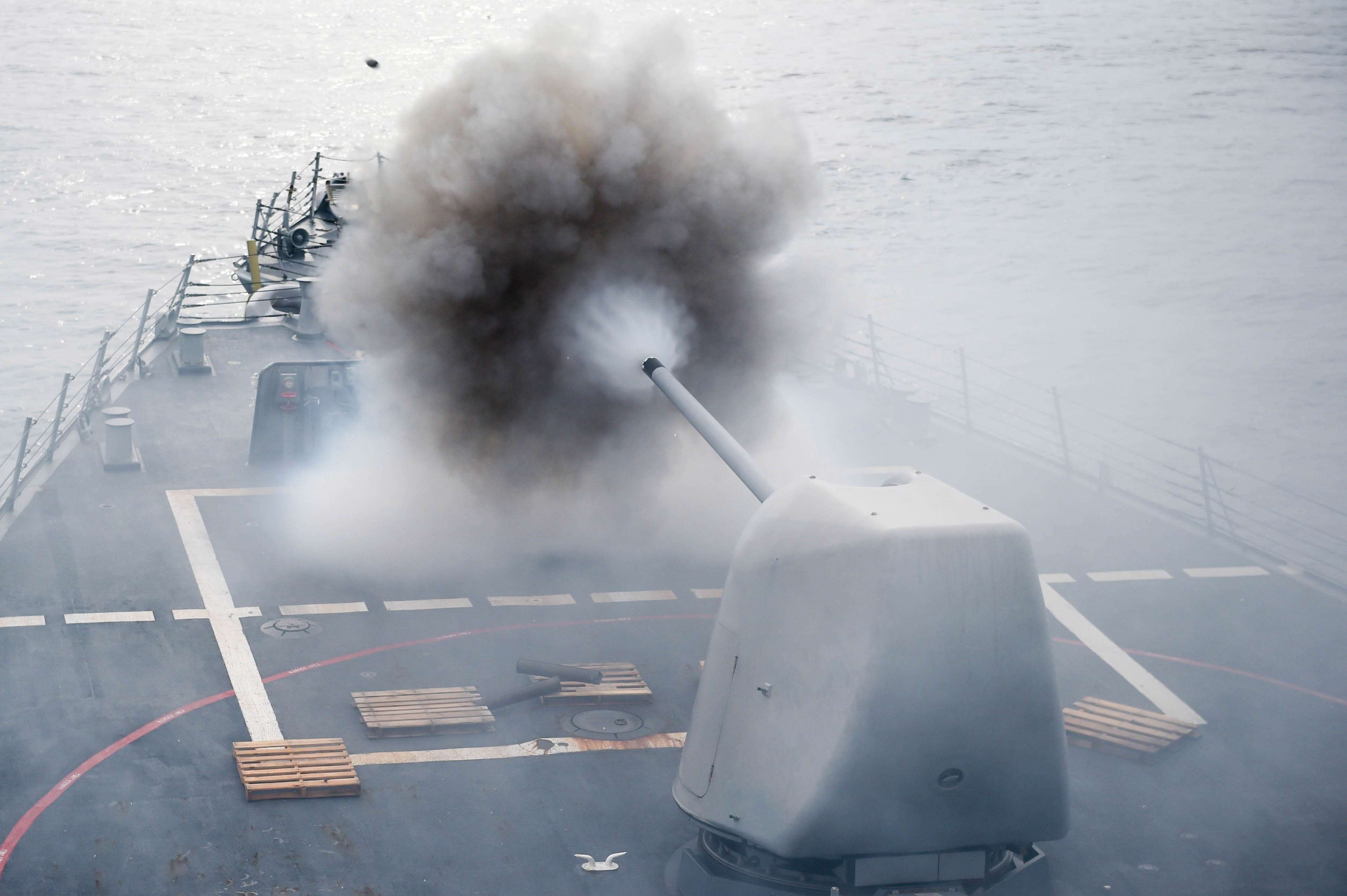 The Arleigh Burke-class guided-missile destroyer USS Stethem conducts a firing exercise in the South China Sea in July. Photo: AFP