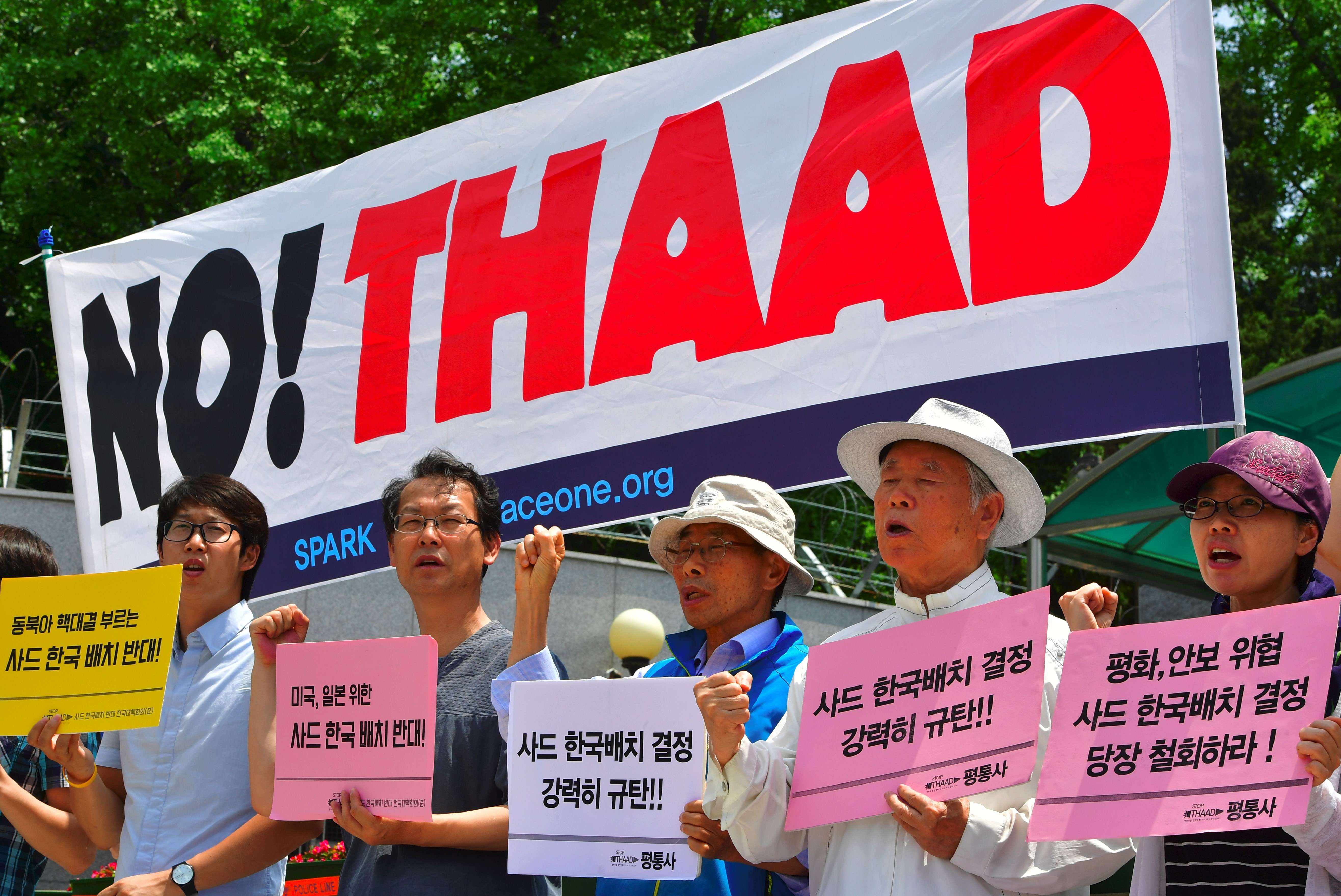 Activists protest against the deployment of the US-built Thaad anti-missile system outside the defence ministry in Seoul. Photo: AFP