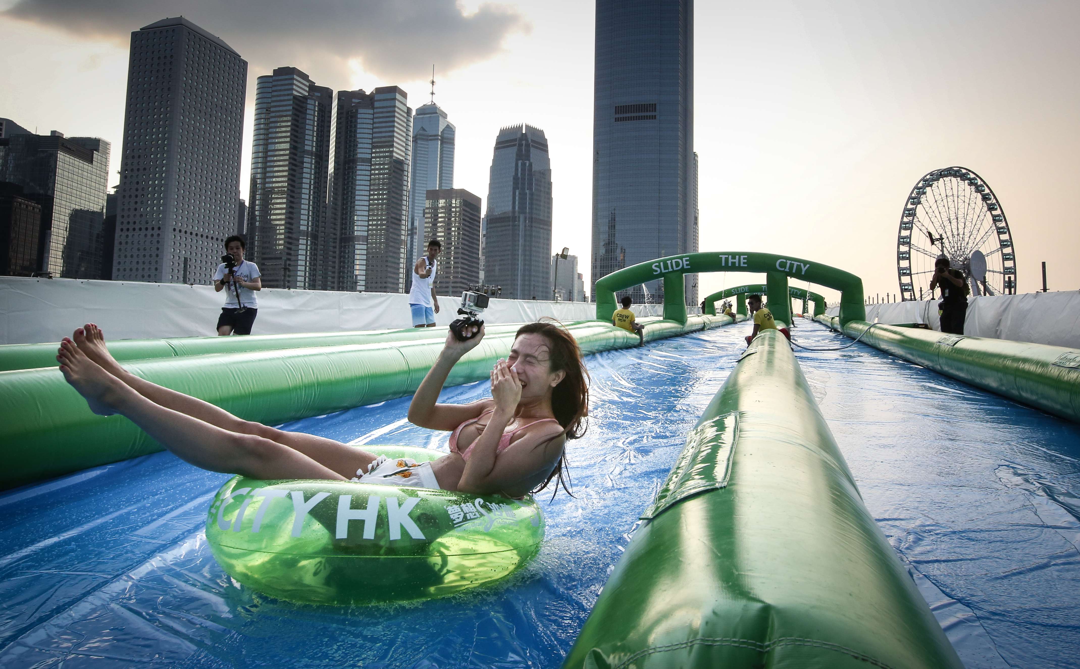 A woman tries out the Slide the City facilities at the Central Harbourfront. Photo: Edward Wong
