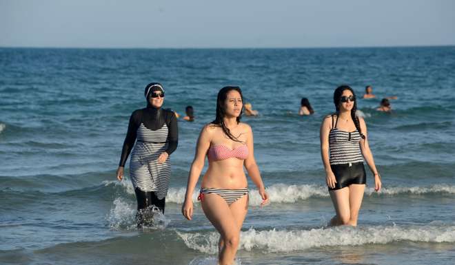 Top French court upholds ban on 'burkini' swimsuits in Grenoble's public  pools