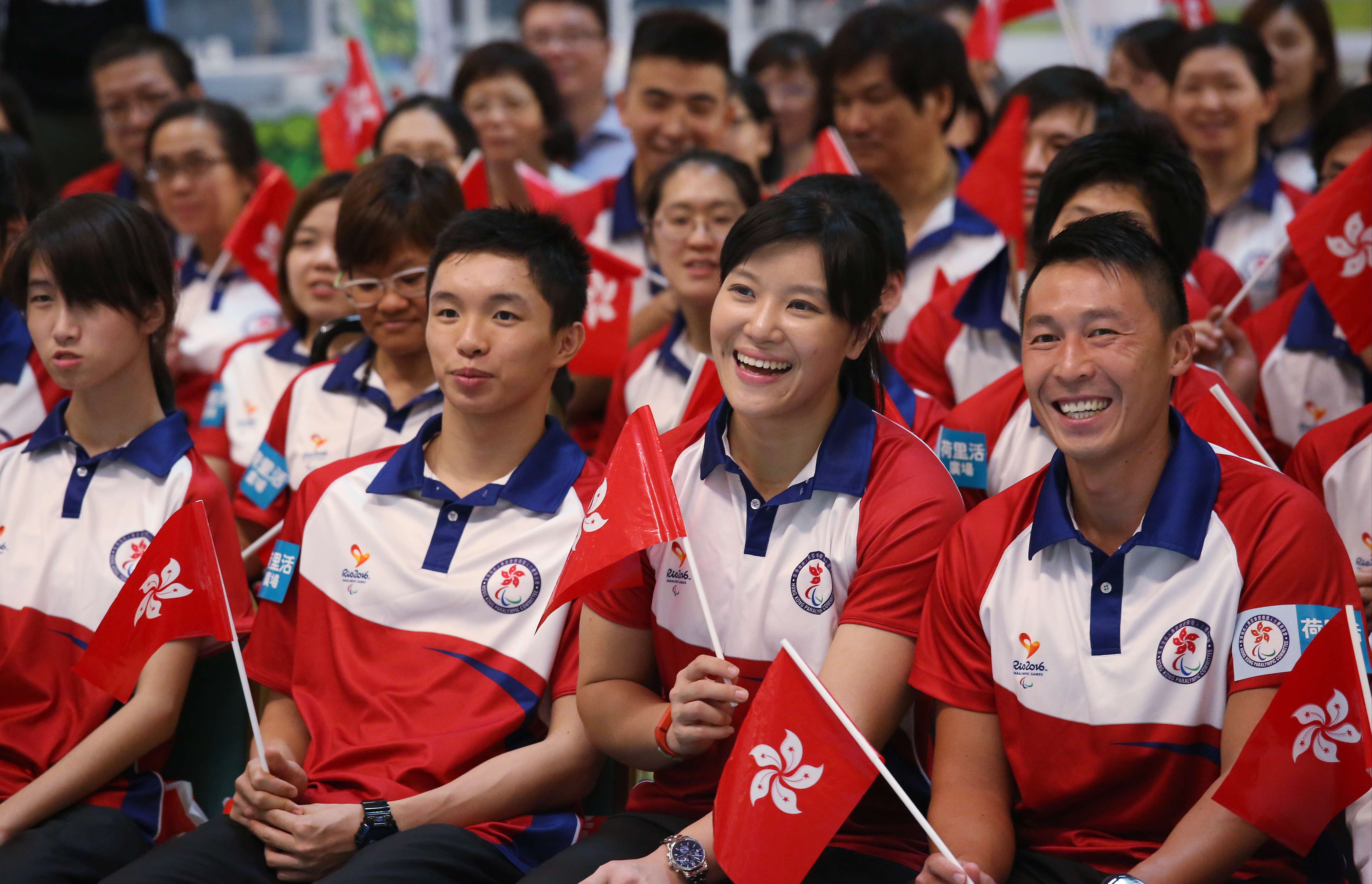 Paralympic swimmer Choi Wa-kit (second left) and wheelchair fencer Yu Chui-yee (third left) at the Rio 2016 Paralympic Games send-off party for the Hong Kong team on August 21. Photo: Nora Tam